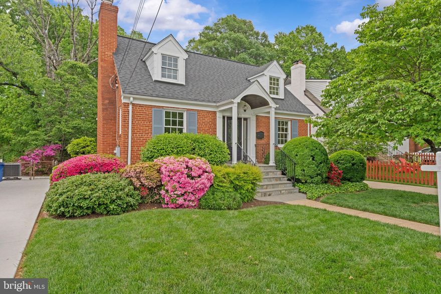 Charming Cape Cod in the highly sought-after North Ridge/Beverly Hills neighborhood! This beautifully expanded home combines timeless charm with modern conveniences, offering a perfect blend of style and functionality. Located on a great street, the classic front portico provides protection from the elements and a wonderful transition space to the home. In addition to its beauty, this home has been meticulously maintained, including a new water heater, washing machine, microwave, and central air conditioning unit all purchased in the past year.
As you enter, the comfortable front living room with a gas fireplace is great for receiving guests.  Warm hardwood floors run throughout the main level, leading from one beautiful space to the next. Ambient light fills the space.  The dining room is a welcoming space for taking meals with guests, and the versatile main-level office could serve as a bedroom, providing flexibility for any lifestyle. The large rear family room addition features extensive built-ins  and more great light and can also be accessed through double pocket doors from the main entrance.  The kitchen/family room combo is the true centerpiece of the main level. It is a great place to create wonderful memories and enjoy entertaining as well as everyday living. 
With four spacious bedrooms and three and a half bathrooms, this home has space for everyone.  The primary suite is a warm and roomy retreat, complete with a walk-in closet, built-in bookshelves across an entire wall, and an en-suite bathroom, creating a private oasis. Downstairs, the finished lower level adds even more living space and versatility. It includes a full bathroom, a flexible bonus room/office, and a large recreation room — perfect for extra privacy and flexibility. The lower level also offers plenty of additional storage space to help stay organized.
The home’s outdoor spaces are just as inviting as the interior. The professionally landscaped yard features mature plantings that bloom beautifully in the spring and summer, offering a serene escape right at home.  Out back, the fully screened in porch is easily accessed from the yard or the family room and overlooks a mature trees that provide shade and a peaceful views.  It is an ideal spot to relax and enjoy the outdoors all year long.  
With off-street driveway parking for two cars and an unbeatable location, it is close to a variety of restaurants and shops. Ice cream, pizza, coffee, sushi, parks, playgrounds and much more is just a short walk away at the Fairlington Centre Plaza and Bradlee Shopping Centers. For even more options, it is also an easy walk to the restaurants and shops of the trendy Shirlington neighborhood.  It is also just under a mile from the vibrant shops and restaurants of Del Ray and a short drive Alexandria’s historic Old Town and waterfront. Commuters will appreciate the easy access to DC, National Airport, all major roadways, and public transportation.
Don’t miss your chance to this timeless and welcoming home your own!