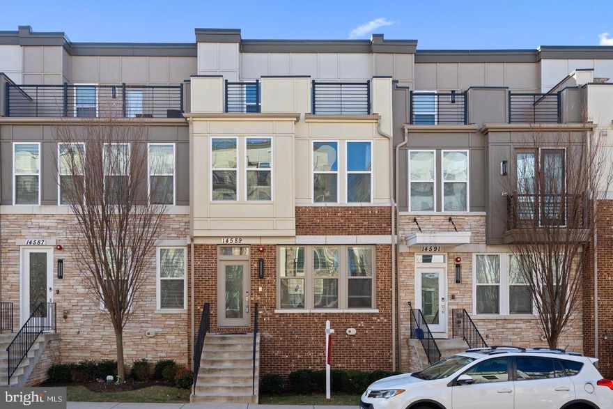 This beautifully designed home offers a perfect blend of style and functionality. The upper level features 2 spacious bedrooms and 2 full bathrooms, while the second upper level includes a third bedroom, an additional full bathroom, and a cozy living room that opens onto a huge deck—ideal for relaxing or entertaining.

Enjoy modern, open-concept living with sleek flooring and an abundance of natural light that fills the space. The seamless flow between the kitchen and living areas creates a bright, airy atmosphere perfect for both everyday living and hosting guests.

Located in a highly sought-after neighborhood, this home provides convenient access to shopping, dining, and essential services. Don’t miss this opportunity to experience contemporary living at its best!

The kitchen is a true highlight for cooking enthusiasts, featuring high-end stainless-steel appliances, generous cabinetry, and a spacious center island. The smart layout provides plenty of room to move and live comfortably.

The attached 2 car garage is thoughtfully outfitted with an EV charging station, durable automotive flooring, and additional lighting for convenience. Adjacent to the garage is a flexible bonus room with a semi-basement design—perfect for a media room, home office, or personalized retreat.

Commuters will love the easy access to Dulles Airport, the Manassas VRE, and the GMU Metro station. Nearby retail hubs like Sully Station and Chantilly Shopping Center make errands quick and easy. Enjoy a variety of parks and outdoor spaces close by for relaxation and recreation.

Located in a friendly neighborhood with excellent access to everyday needs, this home offers the perfect balance of style, comfort, and practicality. Don’t miss the opportunity—schedule your private showing today!