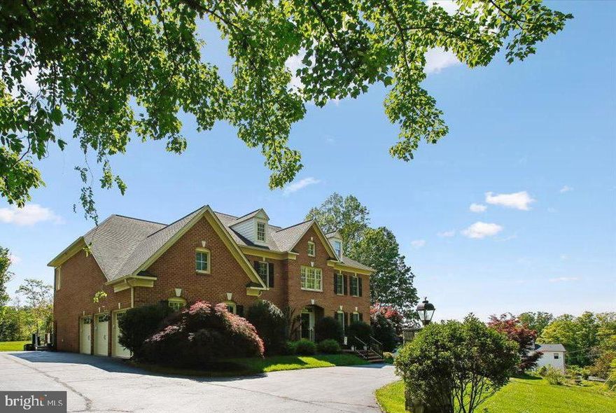 LUXURY LIVING AT A SUPER CONVENIENT LOCATION, JUST 10-15 MINUTES FROM VIENNA METRO AND I-66!  Experience a more refined way of life and entertain in style in this light-infused Renaissance Grand Monet model, a masterpiece spanning 8,600 square feet within the coveted Oakton Crossing community. Recently refreshed with up-to-the-minute 2025 and 2026 upgrades, the home welcomes you with an impressive two-story foyer and 7.5" wide-plank wood flooring that flows throughout the main and upper levels. The open-concept main level is designed for sophisticated entertaining and comfortable living, featuring a two-story great room with floor-to-ceiling Palladian windows and a gourmet kitchen equipped with granite countertops, cherry cabinetry, and a large center island. This level seamlessly transitions from formal dining and living areas to a private office and a versatile sunroom with its own balcony. The breakfast room opens to an expansive deck with a pergola, perfect for indoor-outdoor living on the lush 0.88-acre lot.  The luxury continues upstairs... The upper level serves as a private sanctuary, anchored by an expansive owner’s suite featuring a fireplace-warmed sitting room, a spa-like ensuite bath, and massive walk-in closets. Three additional spacious bedrooms complete this floor, including one with an ensuite bath and a Jack and Jill configuration serving the other two bedrooms....  For multi-generational living, the walk-out lower level offers a massive recreation room with full bath, a gym, bonus room, and a dedicated au pair or in-law suite with its own full bath. ...  Outside, the brick-wrapped exterior is complemented by a circular drive and a three-car garage. The driveway has been expanded in areas for additional parking. The rear yard has room for a pool and play equipment.  Situated within the prestigious Oakton school pyramid and minutes from shopping and dining, this meticulously maintained residence perfectly balances grand architectural detail with modern convenience. Updates/replacements as follows: completely remodeled half bath on main level, added built-ins and surround sound speakers to living room - 2026. Interior repainted, added carpet runners to main level stairs, added recessed lighting to living room, upgraded foyer light fixture, replaced all kitchen appliances, replaced garage doors along with door openers and remote entry devices, 3 HVAC systems replaced - 2025.  Full bath added and au pair/in-law suite created in lower level, water heater replaced, washer replaced, driveway parking expanded and driveway paved, brick driveway aprons added, invisible dog fence added - 2024. Wood flooring added to main and upper levels, primary bath shower door and bath fixtures replaced - 2023.  OPEN HOUSE SATURDAY AND SUNDAY, 1 TO 3.