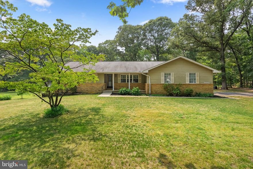 Welcome to 8440 Woodland Rd., situated in Millersville and feeds to the coveted Severna Park School system! This stunning ranch-style residence offers the perfect combination of modern elegance and comfortable living. With 3 bedrooms, 2 full baths, a sunroom, and over an acre of land, this property presents an unparalleled opportunity for a blissful lifestyle.
As you step inside, you'll be greeted by the impeccable craftsmanship and attention to detail that defines this home. The brand new kitchen is an absolute showstopper, featuring luxurious quartz countertops and sleek white shaker cabinets.  The spacious layout of this home effortlessly flows from room to room, offering a seamless blend of functionality and style. The bedrooms provide ample space for relaxation and personalization, while the two full baths offer new vanities and fresh paint.  The home is freshly painted throughout and new flooring in the kitchen and baths.
One of the standout features of this property is the delightful sunroom, providing the perfect spot to bask in natural light and enjoy breathtaking views of the expansive backyard. Imagine sipping your morning coffee or curling up with a good book in this tranquil oasis.  A full unfinished basement leaves plenty of room to expand with another family room, media room or home office.
Situated on over an acre and offering multiple fruit bearing trees including persimmon and peach you will enjoy the outside as much as the inside.  Don't wait to see this one.
Top portion of the driveway is shared with 2 neighbors as there is a right of way.
