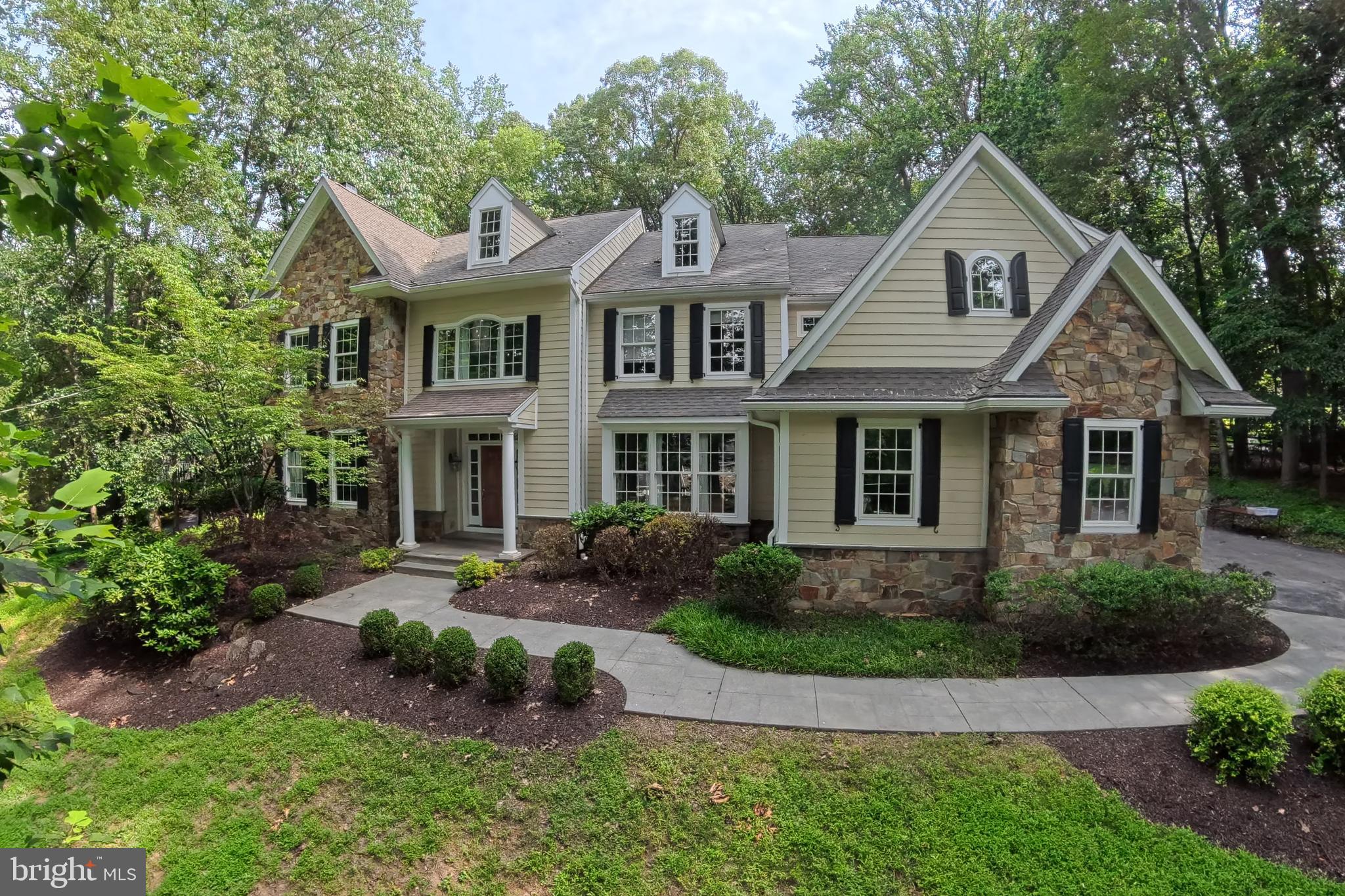 Showings will start when updates are completed: New Site Finished White Oak Hardwood Flooring being installed on 2nd floor, Hardwood Treads being installed on Staircase from Kitchen to 2nd Floor and Staircase to 3rd Floor. Main and Second Floors are getting a fresh coat of White Paint.
This custom built center hall colonial is located on a large wood lot, the location is convenient to everything and is in the top rated Tredyffrin Easttown School District. The open floor plan features large Rooms and high ceilings, Two story entrance Foyer, Living Room with fireplace to the left and formal Dining Room to the right. Straight thru to Family Room with gas fireplace, custom-built ins and palladium window offers amazing views of the property and opens to the Breakfast Room and Kitchen with professional appliances, Island and granite counter tops. Office and Half Bath are adjacent to the Family Room. Mudroom with second Half Bath lead to attached 3 Car Garage. Back staircase off Kitchen to second floor. Master Suite with huge walk in closet and Sitting Room, 4 additional Bedrooms and 2 Full Baths complete the second floor. Walk up 3rd Floor Bonus Family Room.