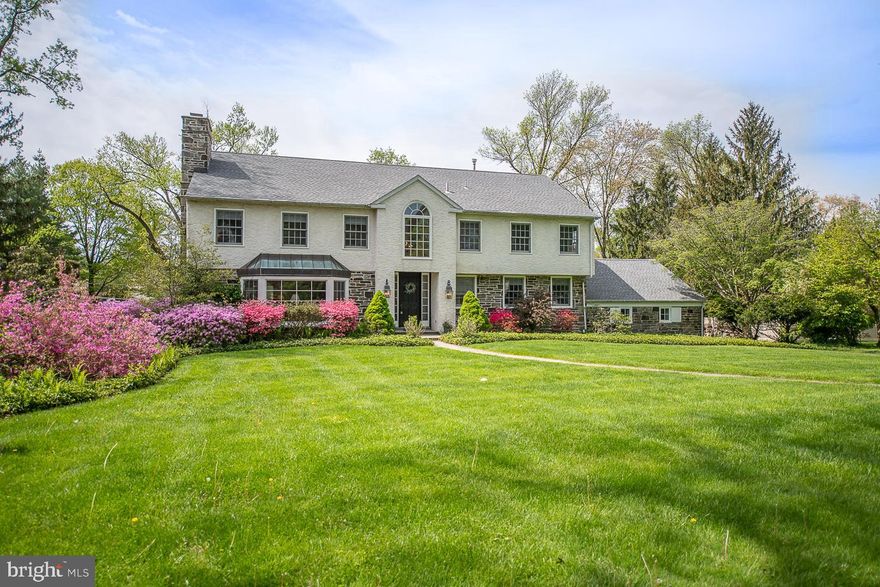 Don’t miss this Bryn Mawr Classic Colonial, custom designed with careful attention to detail. Dramatic two story foyer will greet you with it’s tall ceilings, palladium window and lots of natural light. Entertain in your large formal living room with wood burning fireplace, bay window and lots of sunshine. Formal dining room is spacious and ready for all of your celebrations and holiday dinners! Dining Room opens into the most relaxing Sunroom with tiled floor and plenty of room for entertaining and services the pool area and is perfect for relaxing! Large open kitchen with plenty of cabinets, new appliances including a 6 burner cook top, double oven with convection feature, two dishwashers and double sink. Convenient island design and plenty of room to eat in! You will not miss the fun while cooking, the kitchen opens into the focal point of the first floor. Custom addition with atrium ceiling, two story stone fireplace and French doors to the rear grounds. This room is spectacular and it will be your favorite place for reading a good book, watching sporting events or just relaxing with family and friends! Convenient first floor laundry adjacent to the kitchen. This home features two Master Suites! One on the first floor and one on the second floor! First floor Master Bedroom with  updated ensuite. Additional second bedroom on this level, currently being used as a den. First floor powder room with handicap accessible door width. All of the hall closets are lined up should an elevator need to be installed in the future. Second floor was added in 1992. Large Master Suite with two walk in closets and built ins. Master Bathroom features two separate vanities, bidet, Jacuzzi Tub and separate steam shower. Three additional bedrooms on this floor. One of the bedrooms features it’s own bathroom and there is a hall bathroom. Don’t miss the large cedar closet.  Full sized lower level is set up for entertaining! Large finished area with pool table and wet bar and full bath! This area is accessible from the pool and make entertaining easy… Additional room currently being used as an office could also be used as bedroom or au pair suite etc. There are plenty of closets for additional storage and access to the two car oversized garage.  Beautiful grounds on a large lot perfectly situated. Relax in your heated Armand pool that was resurfaced last year with spa! Entertain on the beautiful patio and enjoy Summers with friends and family! Additional features include beautifully refinished floors throughout, dual zone heat and AC, roof replaced in 2017, new generator will be installed shortly.  Conveniently located to all of the Shops and Restaurants the Main Line has to offer. Convenient to 76,476 and Turnpike. A quick commute to Center City and area Universities.