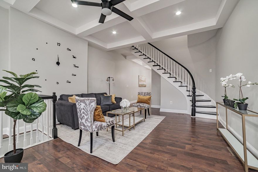 PLEASE SUBMIT YOUR OFFER.   SELLERS ARE MAKING THEIR DECISION MONDAY AT 6:00PM  Take advantage of all of the options the city has to offer, by living approximately 6 to 7 Blocks from Johns Hopkins Hospital! Johns Hopkins Live by where you Work, up to $20,000 in help towards closing cost!  This 4 level, 4 bedroom, 3.5 bathroom almost 2800 finished square feet townhouse is simply ONE OF A KIND, luxury living at its best!!! THIS HOME WAS COMPLETELY GUTTED AND RENOVATED WITH BRAND NEW EVERYTHING AND A DUAL HVAC SYSTEM. Enjoy your top floor MASTER SUITE, WITH A ONE OF A KIND MASTER BATH AND WALK IN CLOSET. The second floor has 3 spacious bedrooms and a full bathroom. The first floor kitchen has beautiful Quartz Countertops as well as modern 42-inch Cabinets with brand new stainless steel appliances. A half bath was added for your family’s convenience, and a perfect living/dining room with 9ft tray ceilings to entertain. The finished basement has a great sitting area with an additional room you can either use as a bedroom or as an office space. The basement also features a full bathroom and a laundry room with a brand new washer and dryer. Outside has an amazing 16ft x 16ft deck perfect for entertaining your family and friends. PLEASE SUBMIT YOUR OFFER.   SELLERS ARE MAKING THEIR DECISION MONDAY AT 6:00PM