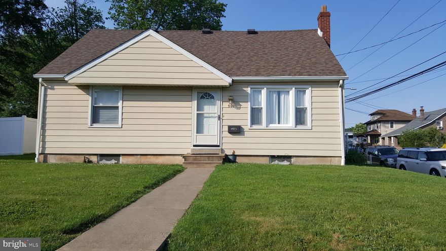 This property is ready to move in. Newer hardwood floors downstairs. Nice painting. New wall to wall carpets upstairs. Lots of windows  Nice sized rooms with lots of closets.  The home sits on a nice sized open lot. Street parking and four spaces out back. Kitchen has double sink. New doors.  Hot water heating tank is a heat pump. Water softener located in full basement.