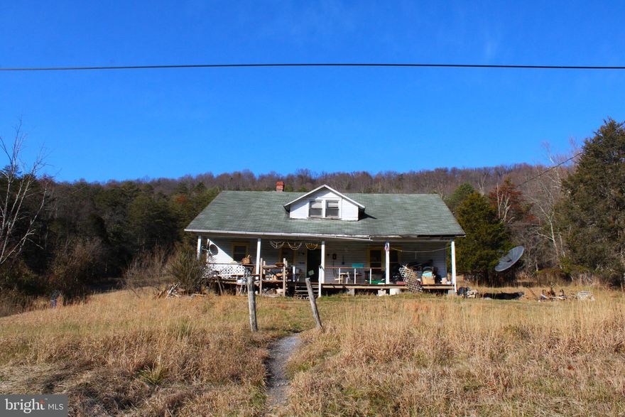 72.97 +/- ACRES OF FIELDS AND WOODS IN A COUNTRY SETTING CAN BE YOURS!!
THIS LAND HAS BEEN FAMILY OWNED SINCE BEFORE CIVIL WAR - THERE IS A SMALL CREEK - SEVERAL SPRINGS - SEVERAL FIELDS AND WOODS - PROPERTY RECENTLY SURVEYED AND CORNERS  MARKED -  A COPY OF THE SURVEY CAN BE OBTAINED - THERE IS AN OLDER FARM HOUSE BUILT AROUND 1935 AND A 2 STORY BARN BUILDING - BOTH IN NEED OF REHAB WORK. 
 THIS PROPERTY WOULD MAKE A GREAT PERMANENT HOME OR A GREAT GET-AWAY IN THE MOUNTAINS OF WESTERN MARYLAND - CLOSE ACCESS TO THE POTOMAC RIVER - C &O CANAL AND APPALACHIAN BIKE TRAIL - OVER 2,1 00 FEET OF ROAD FRONTAGE - PROPERTY SOLD "AS-IS" - ABUNDANT WILDLIFE EVERY WHERE.  APPROXIMATELY 10-15 MINUTES BACK TO TOWN YET OUT IN THE COUNTRY.  AN ADDITIONAL 14+/- ACRES ATTACHED TO THIS PROPERTY IS ALSO AVAILABLE.  SURVEYED

** ADDITIONAL 14 ACRES AVAILABLE FOR $25,000