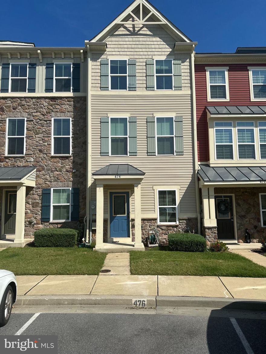 Highly Sought out Creekside Village immaculately kept townhome with 3 bedrooms and 3 bath. Brand new stainless steel appliances,  New ceramic tiles in kitchen. New Carpeting. Step out onto your trex deck backing to woods,  plus 3 true bedroom suites (1 on the entry level; 2 on the top level), a huge rec room, 9' ceilings on EVERY floor.  2 assigned parking spots right out front! This is  an active, vibrant community with regular food truck nights at the clubhouse, a pool, fitness center, dog parks, playgrounds, and all lawn care included for only $99/month.  Easy access to 695/97/100, Fort Meade, Baltimore, Annapolis, BWI airport, dining and shopping. Great Location in a Great Community!!! You’ll Love where you live.