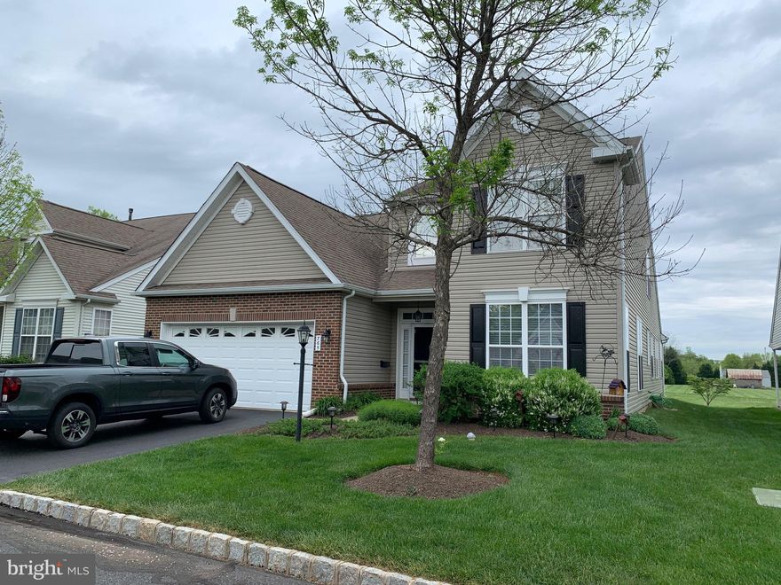 Photos coming Friday. Meticulously maintained and modernized single home in highly desired Traditions at Skippack. Large three bedroom, three full bath home with open field views out back, bonus sun room and many updates. Prior owners made the following updates between 2013-2017: completely remodeled kitchen w/granite counters and sink, under-cabinet lighting, Travertine marble backsplash, new stainless steel appliances, enlarged breakfast bar w/pendant lighting, tile floor and wine fridge; hardwood in living room and dining room; custom built-in bookcases; two downstairs bathrooms fully remodeled with granite; new carpet upstairs. Current owners have replaced: 11 windows, HVAC system, tankless water heater, larger Trex deck (18x10), slider to deck, new Heat n Glo gas fireplace, carpets and paint in downstairs bedrooms, and added a water softener system. Along with the two-car garage, this home has TONS of storage, with two walk-in closets in the master, along with walk-ins in the other two bedrooms, a pantry PLUS an under-stair pantry closet, and upstairs storage rooms sized 19x15 and 6x12. Large master suite w/cathedral ceiling. Community amenities include tennis court (w/pickleball), bocce courts, heated pool, clubhouse with gym, meeting area, kitchen, billiards room and library.