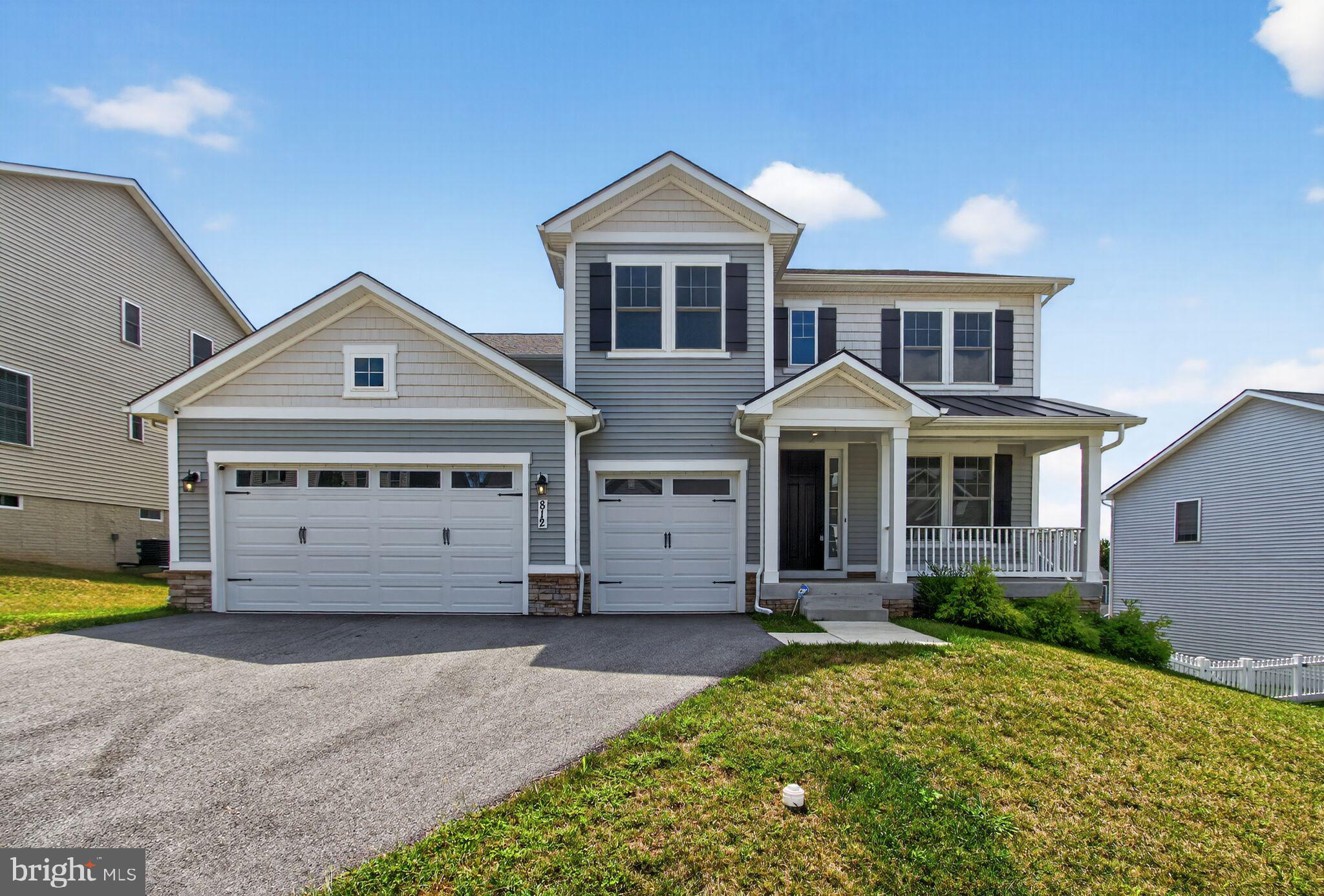 Nestled in the prestigious Brunswick Crossing community, this exquisite 3 car garage Colonial-style residence, built in 2022, offers a harmonious blend of luxury and comfort. Step inside to discover an inviting open floor plan adorned with elegant crown moldings and rich hardwood flooring, creating a warm ambiance throughout. The gourmet kitchen is a chef's dream, featuring upgraded countertops, a double wall oven, and a butler's pantry, perfect for entertaining. Enjoy cozy evenings in the family room, complete with a fireplace, or host formal dinners in the separate dining area. The home boasts a spacious primary suite with a walk-in closet and a luxurious primary bath, while additional bedrooms and a thoughtfully designed layout provide ample space for relaxation. The daylight basement, with walkout access, offers endless possibilities for customization. Outside, the meticulously landscaped lot features a charming front yard and a serene rear yard, ideal for outdoor gatherings. The community amenities include a sparkling pool, tennis courts, and walking paths, fostering an active and vibrant lifestyle. With a three-car garage and energy-efficient appliances, this home is designed for modern living. Experience the perfect blend of elegance and comfort in this exceptional property, where every detail has been thoughtfully curated for an exclusive lifestyle.