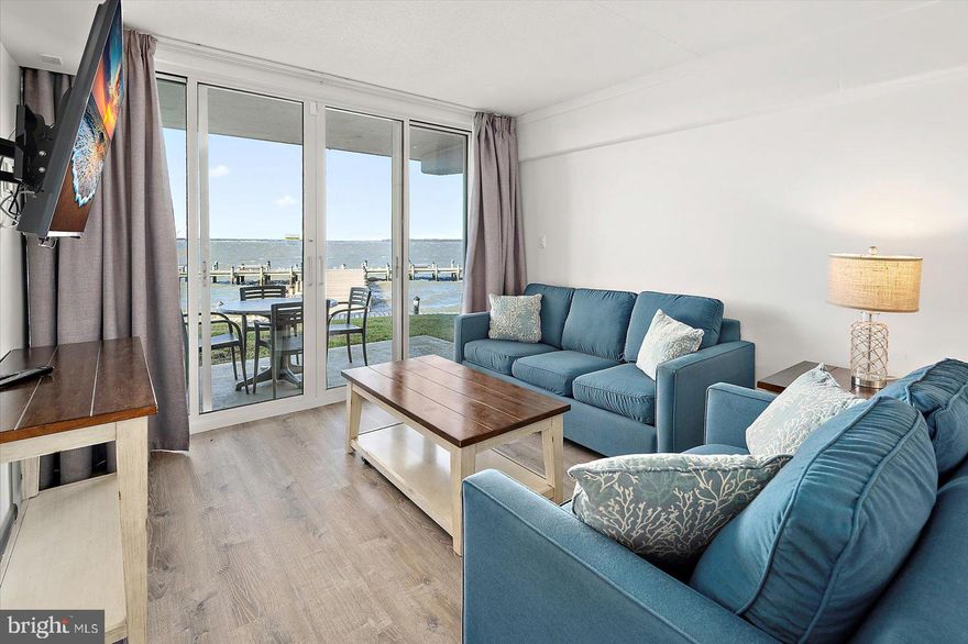 Stunning Renovated Direct Bayfront Condo with 2 Bedrooms, 2 Bathrooms & Community Boat Slips.  Experience Bayfront living at its finest in this beautifully renovated 2-bedroom, 2-bathroom condo featuring breathtaking panoramic views and resort-style amenities.  Upon entering, you’ll be welcomed by a spacious, modern kitchen showcasing granite countertops, solid wood shaker-style cabinetry, and newer stainless steel appliances—perfect for preparing your favorite meals or entertaining guests. The open floor plan flows seamlessly into the dining and living areas, all designed to highlight spectacular water views.  
Throughout the condo, a blend of tile and luxury plank flooring creates an inviting atmosphere that combines comfort and elegance.  The primary suite is a tranquil retreat, featuring corner windows that fill the room with natural light and offer stunning Bay views. The ensuite bathroom includes a tiled tub/shower combination, custom wood vanity, and comfort-height fixtures. Step through the sliding doors to your private balcony, where you can savor panoramic, cruise-like vistas and enjoy serene mornings with the Bay as your backdrop.  The second bedroom is equally spacious and well-appointed, offering luxury vinyl plank flooring, upgraded furnishings, and a private ensuite bathroom with a custom-tiled shower/tub combination and comfort-height vanity.   Additional features include a full-size washer and dryer, ample storage, and thoughtfully designed spaces that maximize comfort and convenience.  Residents enjoy a wealth of community amenities, including a year-round indoor heated pool, reserved parking, and community boat slips. With on-site professional management and maintenance, you can relax knowing everything is taken care of.  Condo fees include water, cable, and internet, adding ease and value to your lifestyle. Recent building upgrades include: New hurricane-grade windows and sliding balcony doors, 
updated exterior lighting and stairway doors, fresh building and roof coatings, enhanced lobby and improved common grounds, and new balcony railings with glass.   Enjoy the perfect combination of modern comfort, low-maintenance living, and unbeatable Bayfront views,  all within a beautifully maintained, amenity-rich community.  Professional pictures to follow.