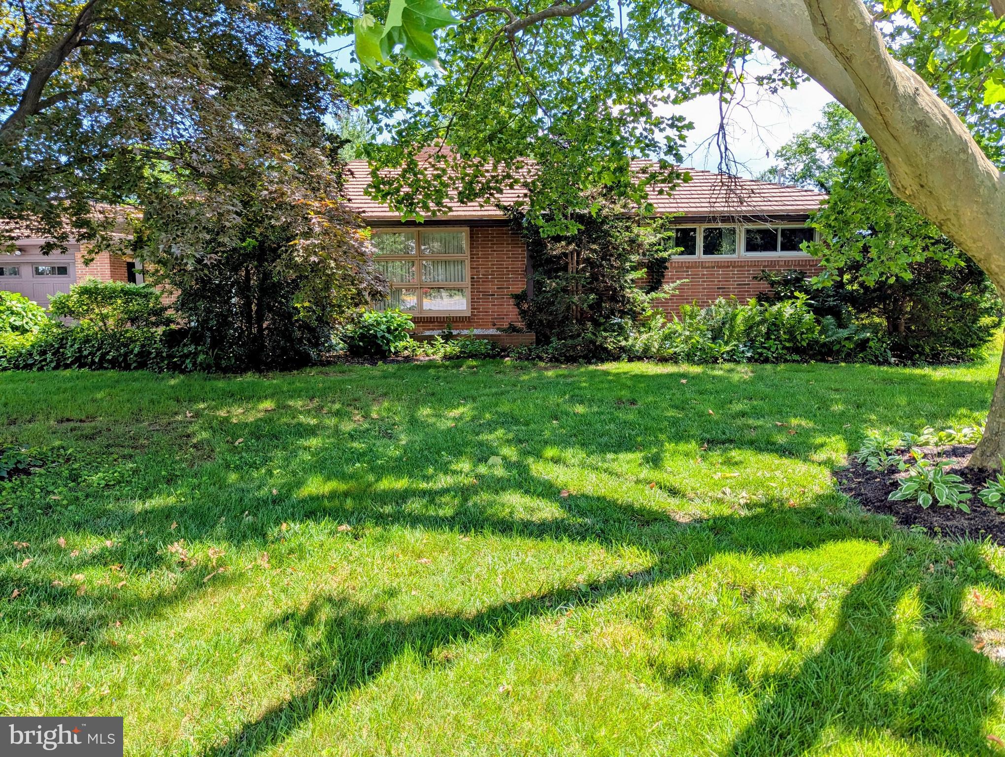 Full brick ranch home on beautiful corner lot. Great roof, heater, windows and hardwood floors/ Some updating needed to suit your taste, but solid place to add your touches. Lower level has a very flexible floor plan and full bathroom. An egress window makes it code compliant.