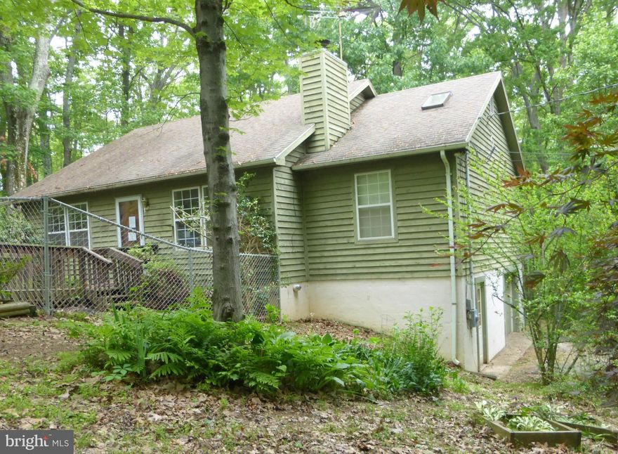 POTENTIAL , POTENTIAL . THIS PROPERTY  SOLD AS IS, NEEDS FLOORING,  IT IS ON SUB FLOORS. GREAT OPPORTUNITY MAKE IT YOURS, NICEST  RANCH ON THE BLOCK; LARGE CORNER LOT, 3BR &   2BA  ,FIREPLACE ON MAIN LEVEL ,  FULL WALK OUT BASEMENT WITH A 3RD  BATH, DOUBLE DECKS,  GREAT LOCATION  TO COMMUTE;  20  MILES TO LEESBURG. SELLER OFFERS ONE YEAR HOME WARRANTY TO OWNER OCCUPANT BUYERS UP TO 500.