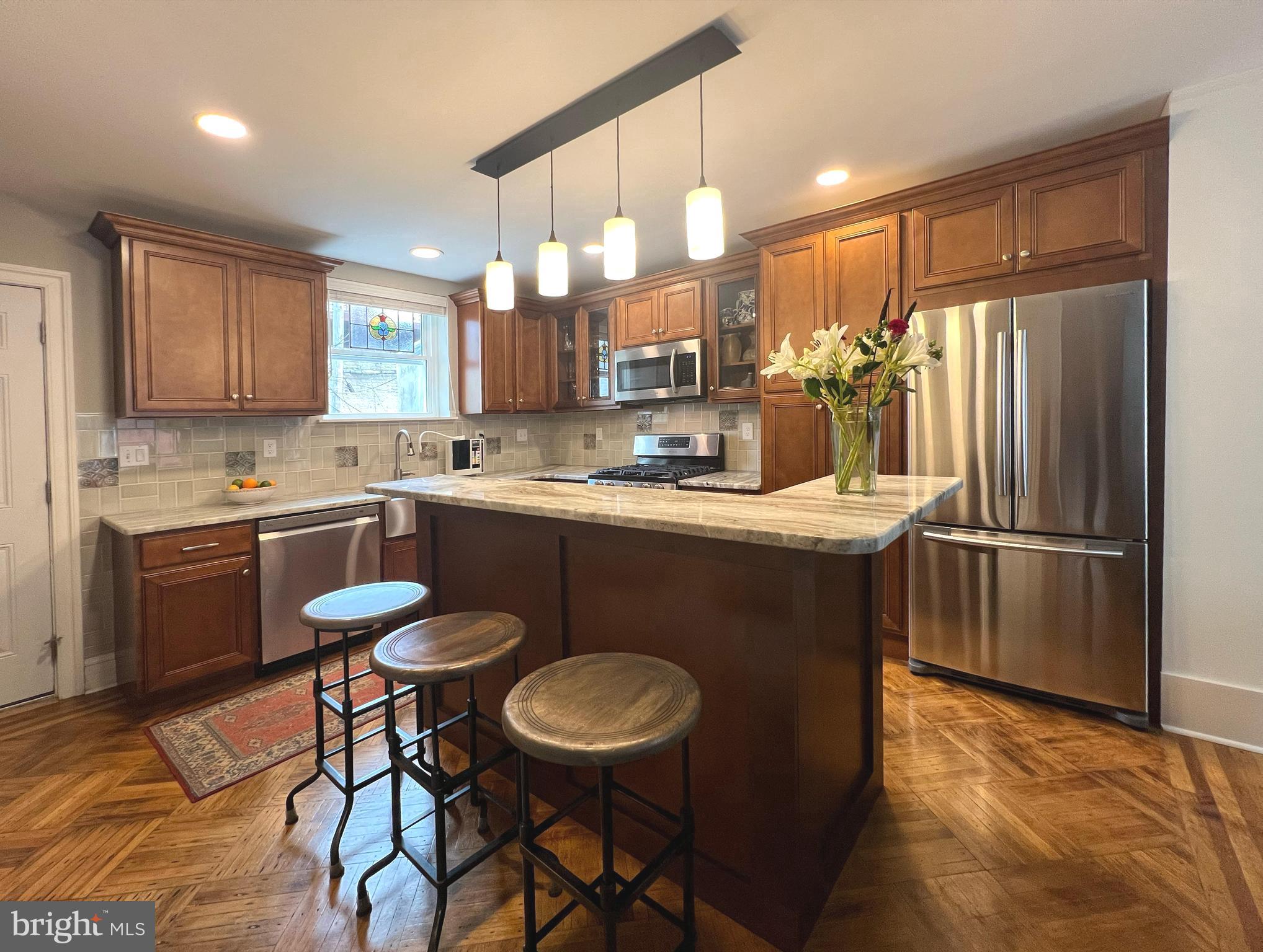 SPECIAL FINANCING AVAILABLE - only 3% down, NO mortgage insurance, a full percent lower than the current interest rate, and possible $6K lender credit and grants. WELCOME TO THE BEST BREWERYTOWN HAS TO OFFER, a completely renovated 4 Bedroom, 2 full Bathroom Townhome in one of the hottest and upcoming sections of Philadelphia. The meticulous renovations to recapture its original early 20th Century character and charm with a tasteful modern flair have been artistically and exactingly designed and overseen over the last few years by the current owner/occupant. This is no HGTV fix and flip! Not an inch of this beautiful home has been left undone, from the carefully restored hardwood floors, the eye-catching staircase, the new gourmet chef's kitchen, the tastefully stylish new bathrooms, the new central HVAC system and new lifetime warranty windows right down to the dry basement and cozy rear patio; just unpack and enjoy. The First Floor features a gracious Entry leading into the light-filled Living Room/Dining Room combination, a fabulous eat-in Gourmet Kitchen and an outside exit to the clean and private Patio that can be partially re-imagined and transformed to create additional living space on all three levels (think Powder Room with formal Dining Room or Family Room, plus Second Floor Art Room or Second or Third Floor Rooftop Deck, etc.). The Second Floor features the Owner's Bedroom, a Guest Bedroom, and a completely remodeled full Bathroom. The Third Floor features two additional Guest Bedrooms, one currently used as the home office, and a brand new full Bathroom. The Basement features the Laundry Area and all of the Utilities. **Real Property Tax Amount has been revised to show what Seller actually paid for 2024 under Homestead Exemption.**
This one of a kind home is close to everything, with easy access to all of the historic sites, shopping, entertainment, restaurants, recreation, sports venues, educational and medical facilities, transportation hubs and even shore points of the Philadelphia and Delaware metropolitan areas; it is conveniently located just a block from Girard Avenue and an easy walk to restaurants, shops, grocery stores and public transportation (including the Trolley system), only about .5 mile to the Schuylkill River Trail, about 1 mile to the Philadelphia Zoo, and only about a 12 minute drive to the Philadelphia International Airport.