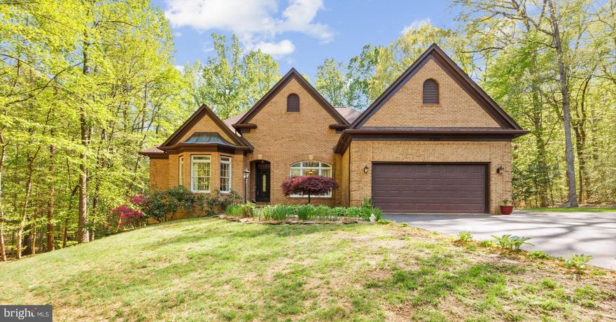 Homes like this don’t come along often. Tucked at the end of a quiet cul-de-sac, this custom-built home sits on a beautiful one-acre lot backing to woods and a peaceful creek—giving you the kind of privacy and setting that’s hard to find, especially in a neighborhood setting.

The backyard is truly a standout. It’s fully fenced, thoughtfully landscaped, and opens up to wooded space that leads down to the creek. It’s the kind of space you’ll actually use—whether it’s relaxing on the patio, gardening, or just enjoying the quiet.

Inside, the home offers two fully finished levels with plenty of room to spread out. You have 5 bedrooms and 4.5 bathrooms, with a layout that just makes sense. The main level features open, comfortable living spaces, while the lower level gives you a ton of flexibility—perfect for a rec room, play space, or hosting guests.

The walkout basement is fully finished and adds a lot of value, with a bedroom, full bath, dedicated office, large utility room, and a workshop/storage area. One feature you don’t see often—heated floors in the basement—makes the space comfortable year-round.

On the main level, the foyer opens into a formal dining room and then into a bright great room filled with natural light. The sunroom overlooks the backyard and connects seamlessly to the deck and patio—an easy flow for everyday living and entertaining.

The primary suite is located on the main level, offering space, privacy, and a nicely updated bathroom with a soaking tub, separate shower, double vanities, and two walk-in closets. There’s also a flexible room at the front of the home with a full bath—ideal for a home office or guest bedroom. Two additional bedrooms are connected by a Jack and Jill bathroom.

The kitchen is well-appointed with black stainless appliances, granite countertops, and a casual dining area that opens to a cozy family room with a gas fireplace.

Beyond the home itself, you’re in Meadowbrook Woods—an established, amenity-rich community with pools, swim team, tennis and basketball courts, playgrounds, a stocked lake, and a clubhouse. All of that, while still being close to shopping, dining, and commuter routes.

This home also reflects quality construction and care, with features like 2x6 exterior walls, Anderson windows, crown molding, and a long list of updates including a newer roof, updated flooring, renovated bathrooms, kitchen improvements, HVAC servicing, programmable hot water heater, and epoxy flooring in the garage.

If you’re looking for a home that offers space, privacy, and a setting that actually feels like an escape—while still being close to everything—you’ll want to see this one in person.