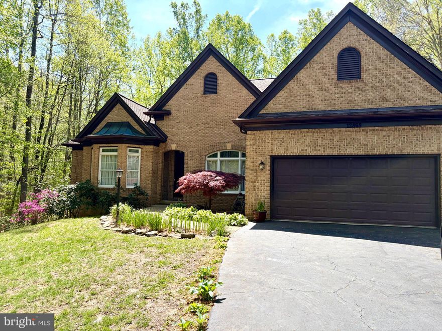 Homes like this don’t come along often. Tucked at the end of a quiet cul-de-sac, this custom-built home sits on a beautiful one-acre lot backing to woods and a peaceful creek—giving you the kind of privacy and setting that’s hard to find, especially in a neighborhood setting.

The backyard is truly a standout. It’s fully fenced, thoughtfully landscaped, and opens up to wooded space that leads down to the creek. It’s the kind of space you’ll actually use—whether it’s relaxing on the patio, gardening, or just enjoying the quiet.

Inside, the home offers two fully finished levels with plenty of room to spread out. You have 5 bedrooms and 4.5 bathrooms, with a layout that just makes sense. The main level features open, comfortable living spaces, while the lower level gives you a ton of flexibility—perfect for a rec room, play space, or hosting guests.

The walkout basement is fully finished and adds a lot of value, with a bedroom, full bath, dedicated office, large utility room, and a workshop/storage area. One feature you don’t see often—heated floors in the basement—makes the space comfortable year-round.

On the main level, the foyer opens into a formal dining room and then into a bright great room filled with natural light. The sunroom overlooks the backyard and connects seamlessly to the deck and patio—an easy flow for everyday living and entertaining.

The primary suite is located on the main level, offering space, privacy, and a nicely updated bathroom with a soaking tub, separate shower, double vanities, and two walk-in closets. There’s also a flexible room at the front of the home with a full bath—ideal for a home office or guest bedroom. Two additional bedrooms are connected by a Jack and Jill bathroom.

The kitchen is well-appointed with black stainless appliances, granite countertops, and a casual dining area that opens to a cozy family room with a gas fireplace.

Beyond the home itself, you’re in Meadowbrook Woods—an established, amenity-rich community with pools, swim team, tennis and basketball courts, playgrounds, a stocked lake, and a clubhouse. All of that, while still being close to shopping, dining, and commuter routes.

This home also reflects quality construction and care, with features like 2x6 exterior walls, Anderson windows, crown molding, and a long list of updates including a newer roof, updated flooring, renovated bathrooms, kitchen improvements, HVAC servicing, programmable hot water heater, and epoxy flooring in the garage.

If you’re looking for a home that offers space, privacy, and a setting that actually feels like an escape—while still being close to everything—you’ll want to see this one in person.