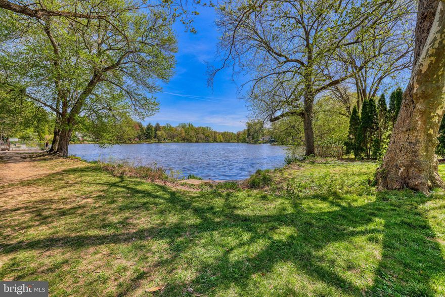 Unobstructed views of a meadow and lake are a rare find in Lower Makefield - but that's exactly what this home offers.  Located in a sought-after neighborhood, this 4 bedroom 2 1/2 bath residence is ready for updating with unlimited potential to make it your own.  Beneath the carpeting, you'll find hardwood floors through all but the family room, adding to its value and charm.  The spacious dining room comfortably accommodates 12 guests, making it ideal for entertaining.  All 4 bedrooms are generously sized, including the primary suite which features a walk-in closet and en-suite bath.  The family room features a fireplace with sliding doors to the back yard, a powder room and entry to garage.   It's a short walk to the elementary school, train to Philadelphia, Yardley Country Club, and the charming Boro of Yardley.  With solid bones and an exceptional setting, this home is the perfect canvas for YOUR vision.  Don't wait to see this  wonderful home