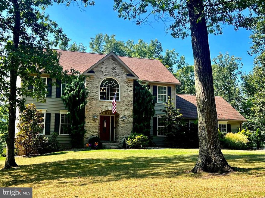 Wild and Wonderful West Virginia is calling your name! This immaculate 4 Bedroom, 2.5 bath is in the much desired Colonial Heights subdivision in Mineral County- Frankfort District. Plenty of square footage for all to enjoy. Upon entry, you are greeted with a massive foyer with a beautiful staircase  and cathedral ceilings. The main level floorplan is spacious and the flow is continuous from room to room. Family room, formal living area, dining room, and kitchen- everyone can feel included no matter what room you are in. The gourmet kitchen features center island, stainless steel appliances, and access to the beautiful outdoor deck. Half bath and laundry room are also available on the main level. Upstairs you will find the 4 bedrooms, a quaint seating area overlooking foyer, and 2 full baths. The owners suite features jacuzzi tub, separate shower, double sinks, and large walk-in closet. The remaining bedrooms are spacious and include nice closets. Did I mention this home sits on over 4 acres. Enjoy peaceful nights on the non-maintenance deck overlooking  the mountains. 2 car garage and a full unfinished basement with walk out doors to a concrete patio. Only minutes to Cumberland MD, Northrup Grumman, IBM, UPMC Western MD, and more. Call today for a showing!