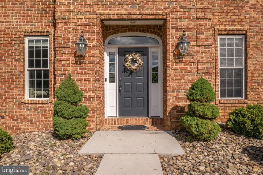 Video Tour is a MUST SEE! Ask for it Today!
Where Luxury Lives — And Nature Awaits Just Beyond Your Back Door
This brick colonial in the Greencastle Greens Golf Community delivers over 4,650 finished square feet of thoughtfully upgraded living space — and then offers something truly rare: your own private pathway to nature, steps from the Conococheague Creek.
From the moment you enter, the scale and quality make an impression. The gourmet kitchen is where this home truly earns its reputation. Stretching 26x13 feet with over 40 feet of counter space, this is a kitchen that handles everything from quiet weekday breakfasts to full holiday gatherings without breaking a sweat. The 10-foot island anchors the space beautifully, wrapped in Kashmire White granite and surrounded by LifeArt solid wood cabinetry with furniture-grade finishes, dovetail drawer construction, 42-inch wall cabinets, and 65 soft-close doors and drawers — including four glass-front display cabinets that add a touch of elegance. A gas cooking range, stainless appliances, convenient pantry, recessed lighting, casement windows, and a reverse osmosis drinking water system complete a kitchen that is as functional as it is stunning. A sliding door opens directly to the rear deck, making outdoor dining effortless.
The sunken family room — with its gas fireplace and French doors — flows seamlessly to a 30x14 rear deck overlooking a wooded backdrop built for every season.
Upstairs, the primary suite is a world of its own: trayed ceilings, a private sitting room with a gas fireplace, an intimate morning coffee balcony, and a spa-inspired bath complete with dual vanities, a jetted soaking tub, and a glass walk-in shower.
The lower level raises the bar entirely — a 48-foot rec room anchored by a 17-foot horseshoe granite wet bar with Brooklyn loft-style brick wall accents, a full bath, and a dedicated theater room with projector and screen. 
For peace of mind in 2020 the roof had a major upgrade to 50 Year Long-Life, IKO Dynasty/Cambridge Architectural Shingles and to give additional comfort and security, the heat pumps have been recently replaced; one in 2021 and the other in 2023.
Then step outside — and let the land tell its own story. A short walk through your wooded backyard opens up to over an acre of flat, open ground a few steps from the banks of the Conococheague Creek — and what awaits you there is nothing short of remarkable. This is the kind of land that invites you to slow down and build something meaningful. Pitch a tent and wake up to wild flowers and bird songs. Raise a pavilion for family gatherings under the trees. Carve out a meditation space where the sounds are mostly water, wind, and wildlife. Watch deer slip quietly through the tree line. Listen to ducks and geese settle onto the creek at dusk. Spot wild turkey moving through the brush, and squirrels working the canopy overhead. As evening falls, the soundtrack shifts — spring peepers, crickets, tree frogs, and the distant call of an owl fill the air in a way no playlist ever could. Why drive fifty miles for a weekend escape when yours is already waiting, just steps from your back door?
Located in the sought-after Greencastle-Antrim School District, minutes to I-81, with recent upgrades throughout.
Schedule your private tour today and experience everything this extraordinary home — and its land — has waiting for you.