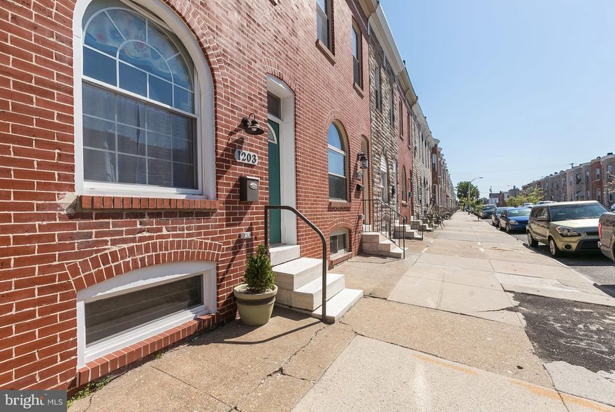 Conveniently located within walking distance to stadium attractions & downtown. Open concept with eat in kitchen, main level powder room, mud room & coat closet & exposed brick.  2nd level offers walk-in closets in hall & MBR with over sized linen closet. Rear bedroom has door leading to future deck. Unfinished lower level and off street parking at rear for one car.  Ideal home for room mates.