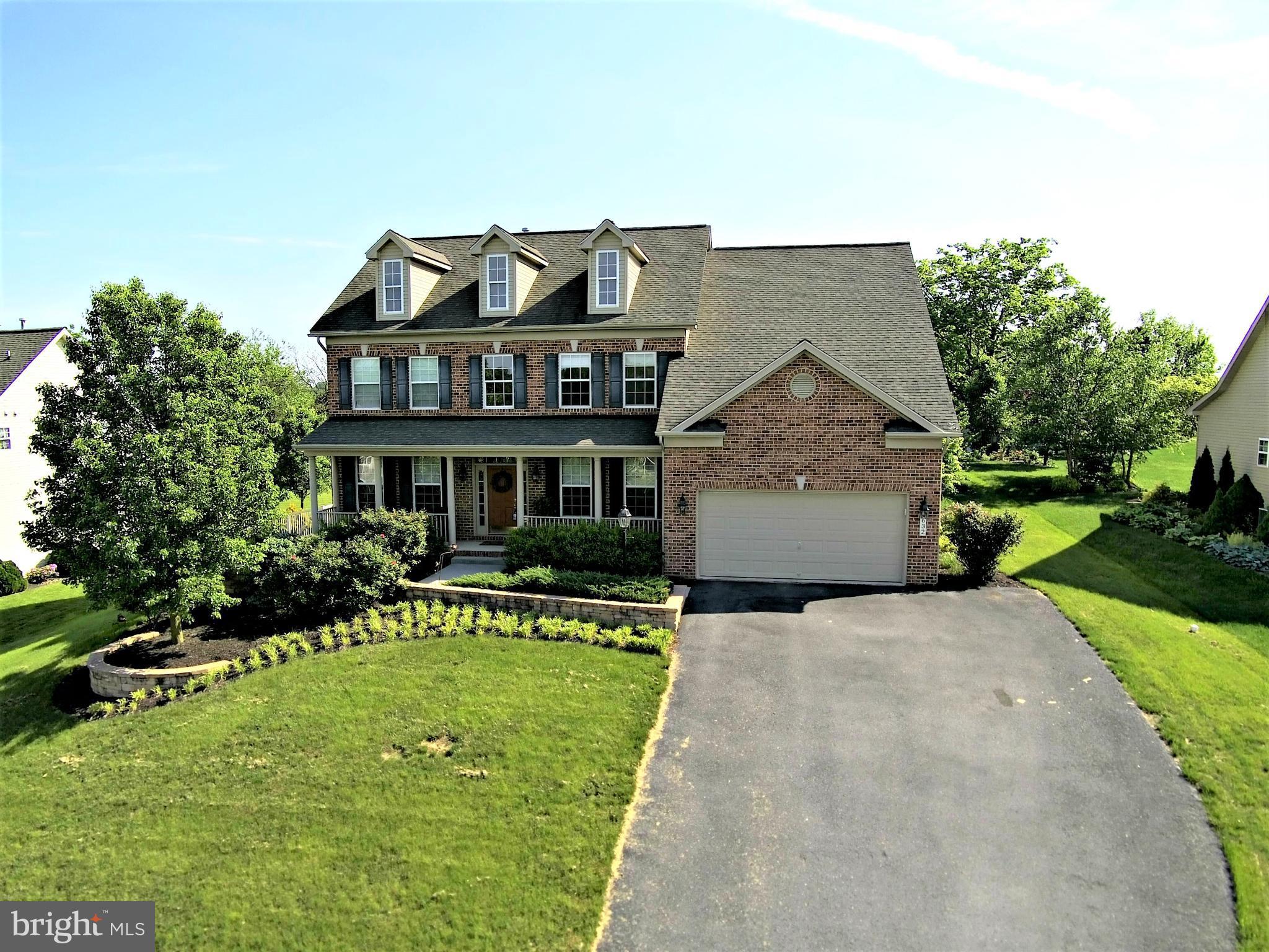 EXCEPTIONAL!  Offering 4 bdrms, large master suite w/sitting rm, main level fam rm w/gas FP & built-in bookshelves, open kit w/granite counters and lots of cabinets, breakfast rm plus formal dining rm & office/den. Finished basement w/rec rm & den and full bath.  Great backyard for entertaining with paver patio, built-in fire pit, composite deck and flat backyard w/country view. (HOA is inactive)