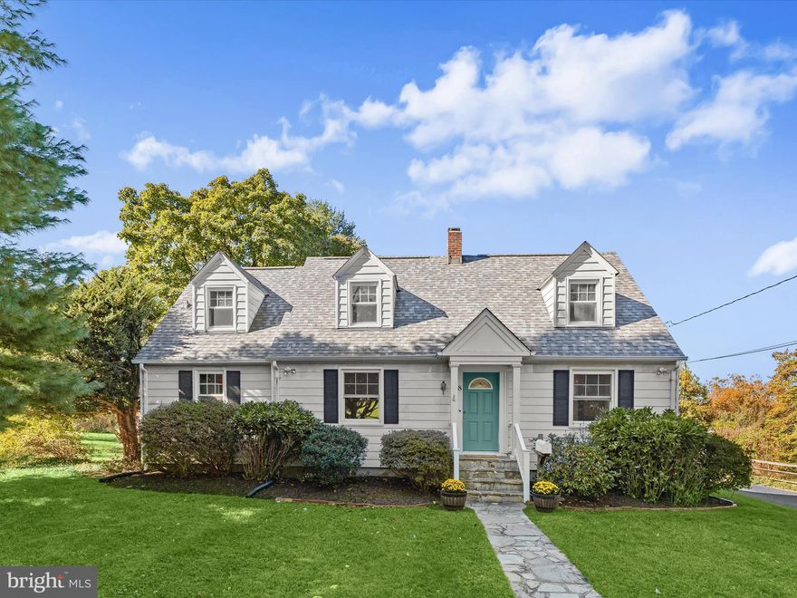 Welcome to 8 Seminole Avenue, a picture-perfect Cape Cod nestled in the sought-after Oak Forest community. This delightful home combines classic character with thoughtful design, featuring an extended main-level primary suite featuring vaulted ceiling with recessed lighting, multiple closets and an en-suite full bath.  Enjoy access to the covered porch ideal for morning coffee or evening relaxation watching the sunset.  A spacious den/office and a second full bath add function and appeal. The traditional floor plan offers a warm and inviting living room anchored by a woodburning fireplace and built-in shelving, a lovely dining room with original corner cabinets, and a bright kitchen with ample cherry cabinetry and a door to the covered porch and backyard + laundry room. Upstairs, you will find two additional bedrooms, including one with an attached bonus room perfect for a home office, playroom or gym along with a full bath and hallway access to a private balcony. The lower level provides a recreation room, rough in plumbing, a workshop and generous storage space. Showcasing original hardwood floors, arched doorways, and built-ins, this home radiates charm. Set on a picturesque .31 acre lot with a detached two car garage and extended driveway, 8 Seminole Avenue offers the perfect blend of comfort and space. A whole house natural gas generator and a recent roof are desirable additions. Enjoy being in close proximity to locally owned shops and restaurants, Sunday Farmer's market, 4th of July festivities, free music venues, Patapsco Valley State Park, walking and biking trails and convenient commuter routes.
Some photos have been virtually staged