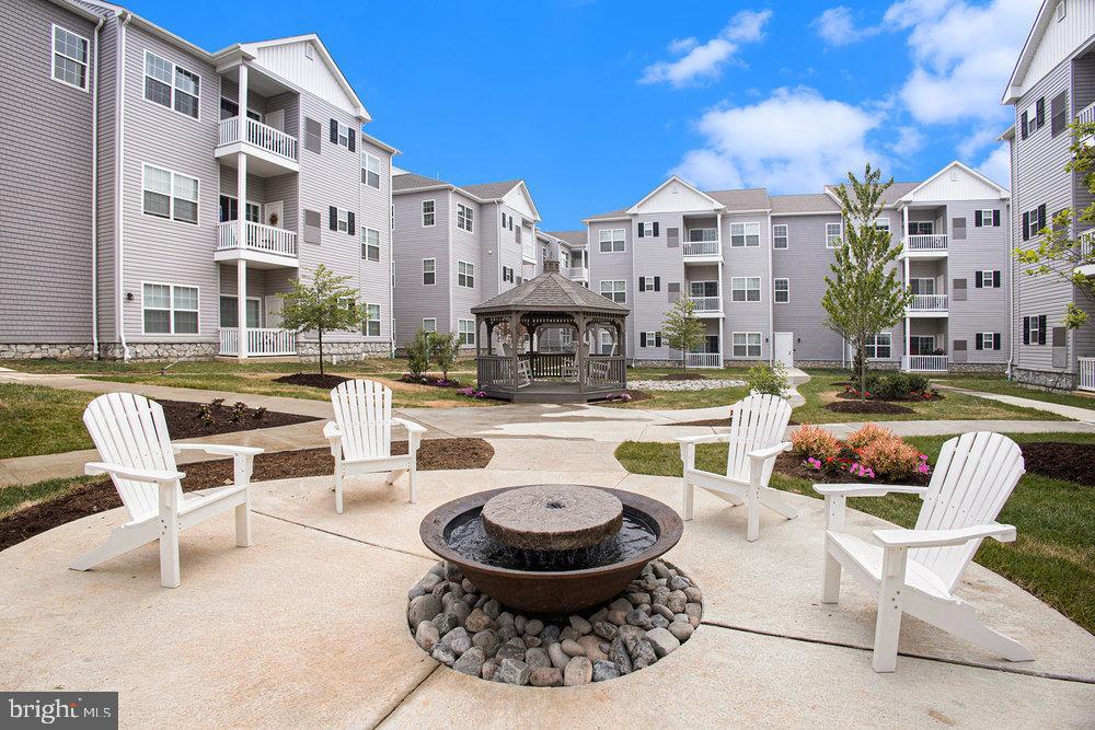 Welcome to The Residences at Brookhaven Glen, Delaware County's newest active 55+ adult community*, new construction at its finest!! Tour the model at Unit 113 to see a completed unit, then choose our own selections. In each of these homes, an entry foyer with an open floor plan and a gorgeous kitchen greets you. Each unit has 2 bedrooms & a bonus room which could be a 3rd bedroom, an office or a den along with 2 full baths. The living area is beautiful and has sliders to a lovely patio (1st floor) or balcony (2nd and 3rd floors). Living rooms can be expanded by eliminating the 3rd bedroom/office/den. Beautiful 9 foot dramatic ceilings make this floor plan seem even more spacious. These units also boast raised panel doors throughout with custom hardware, vinyl plank flooring in foyer, living room, dining area, and kitchen, Superior Shaw stain-resistant carpeting in a variety of colors for den/bedrooms, and "Progress Lighting" lighting package in foyer/dining area/kitchen. Kitchen also has many choices of cabinets, stainless steel undermount sinks, granite counter tops, gas cooking, and Stainless Steal GE appliances. A full size washer and dryer are also included in each condo. The beautiful master suite and 2nd bedroom feature customizable flooring and lighting, and the master suite includes a walk-in closet and a full bathroom with a double sink. The full hall bath features a large stall shower. There are so many beautiful choices in these homes, and on-site amenities include a private dog park (to be ready soon), gorgeous courtyard with lovely landscaping includes water fountain with amazing history, and gazebo (with rocking chairs for your relaxation) and 2 pergolas with natural gas grills for your grilling pleasure. All buildings completely ADA accessible and also include an elevator. Conveniently located just minutes from I-95, Route 1, the Blue Route, Media Boro, the airport and lots of shopping and restaurants! (84 Units Total. 7 buildings each with 3 levels, 12 units per building). Come see! You won't be disappointed! Another great perk is that seller is willing to accept Home Sale Contingencies! Beautiful community, lovely grounds, several units move in ready or customize your own home with all your personal choices! MODEL is Unit 212. Call for appointment as Model hours vary weekly. *Community currently under the 80/20 rule, so these homes are also available to residents over the age of 19 Chances are very good (based on other similar homes in Brookhaven ) that once an appeal is filed, taxes will be reduced.