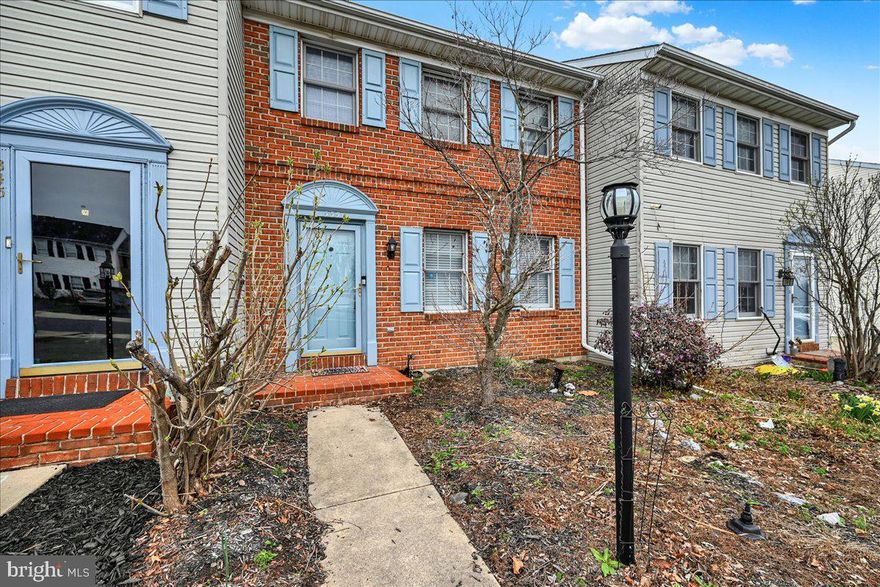 Unlock exceptional value with this modern townhome. Boasting 3 bedrooms, 1.5 baths, and a finished walkout basement, this property offers significant living space. The full bathroom has recently been updated with tile around the shower/bath and tile floors. There are new laminate plank & tile floors throughout the home offering a beautiful, updated feel! The open floorplan between the kitchen and dining room is great for entertaining. You have lots of space to relax with both a living room on the main level and finished family room in the walkout basement with built-in shelving and electric fireplace. Enjoy outdoor living with a private deck and patio overlooking beautiful views to enjoy the sunset. Enjoy efficient natural gas forced air heating and AC - make this home your own!