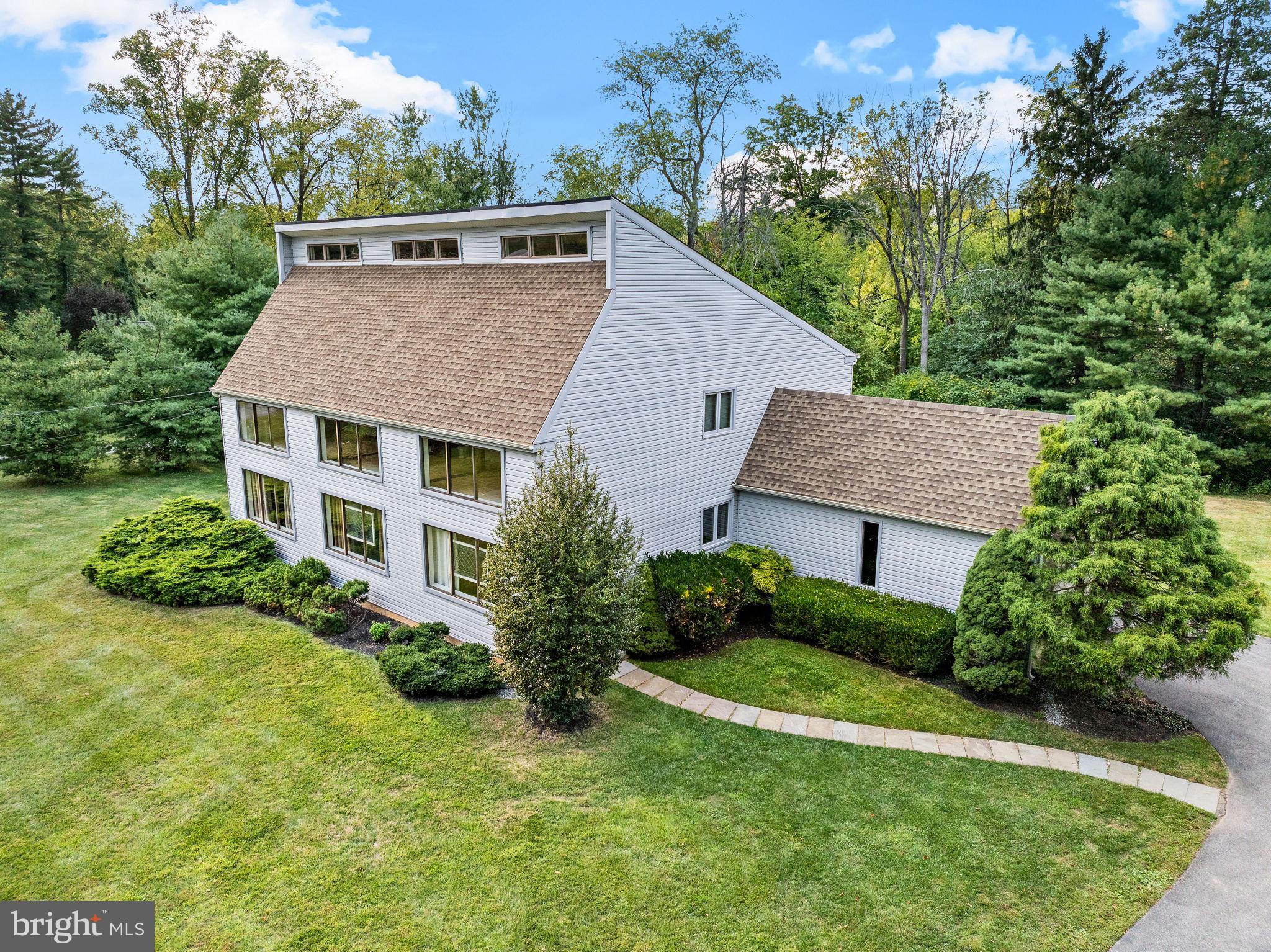 Exceptional home in the Greene Countrie section of Newtown Square! ✨ Country convenience abounds! ✅ Close to shopping, excellent dining, and Whole Foods. ✅ Award-winning public and private schools, several country clubs and the coveted Radnor Hunt Club are nearby ✅ Multiple walking trails are less than a mile away. Ridley Creek State Park and several public land preserves are minutes by car ✅ and you are 30 minutes to the airport, stadiums, and Philadelphia.
🌲Located on an acre that backs to woods, this custom home was built in 1985 by Bentley Homes and has only had two owners. It has been updated and maintained impeccably so that it almost feels like new construction. 🙌🏼 The original owners updated many things before selling it, including a new Trane HVAC system and new hot water heater in 2019. The current owners replaced the roof, siding, downspouts, gutters and overhead garage door in 2019. A new shed was purchased in 2022 and the deck was replaced in 2024. (See the seller's disclosure for a full list of improvements).
A flagstone walkway leads to a new front door (2022) with sidelight. ✔️A spacious first floor boasts hardwood floors throughout, a wood burning fireplace with built-ins, a foyer with a walk-in closet, two pantries, a powder room, guest room, and laundry room. ✔️The second floor hosts a large master suite, and two additional bedrooms (one of which is almost as big as the master bedroom and has a walk-in closet), and a hall bath. ✔️There is an additional 500 sq. feet of partially finished space on the second floor waiting to be transformed. ✔️The full basement houses two offices, a spacious recreation room and exercise space along with two large storage closets and a second fridge/freezer. ✔️The attached two car garage has a workbench with shelves above and enters into the laundry room. This is truly move-in ready! **Showings start 4/26**
Owner is a licensed PA real estate agent.