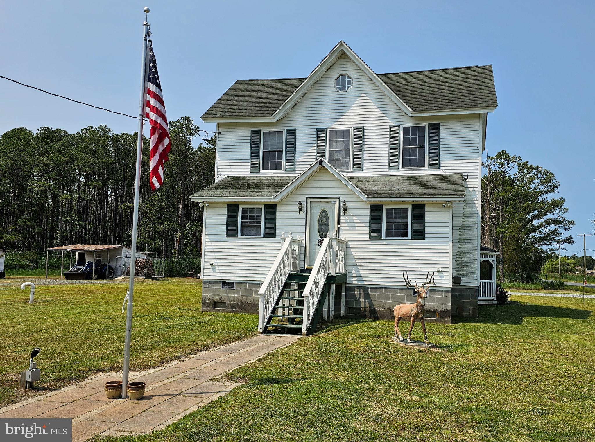 Quiet, county living is yours with this beautifully updated 3 bedroom, 2 bath farmhouse. Warm and welcoming foyer, cozy living room with adjacent office and spacious eat-in kitchen. Large laundry/utility room. Pamper yourself in the first- floor owners suite. Two more spacious bedrooms and bonus room complete the second floor. Take in our famous Eastern Shore sunsets from the rear deck or gazebo.Expansive one acre lot and four outbuildings to handle your workspace and storage needs. Just minutes from the Rumbley boat ramp for your day of fishing and crabbing or explore the nearby 4000-acre Fairmount Wildlife Management Area. Tens of thousands of acres of other public lands are a short drive away for waterfowl hunting, deer and turkey hunting, hiking, birdwatching, and biking. The serenity of rural living in Somerset County awaits. Schedule your tour TODAY!