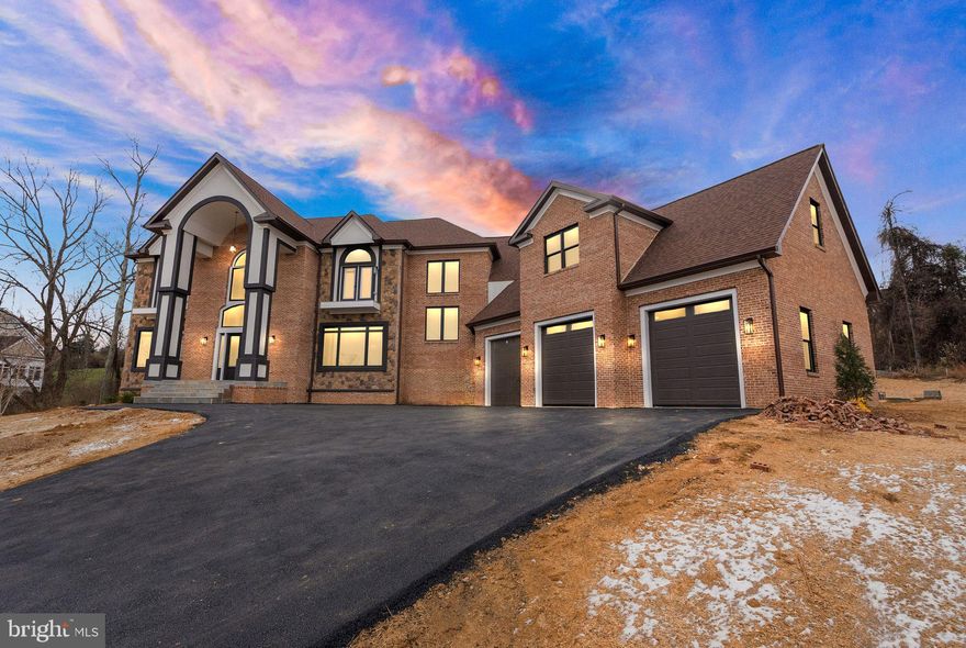 Torus Bagels Catered at the Open House on Saturday between 1-4pm! 
 Introducing an extraordinary new construction estate in the prestigious Beacon Hill community of Leesburg, Virginia. Built by the renowned New Village Builders and slated for completion in 2025, this nearly 10,000 sq ft residence on three finished levels offers the ultimate blend of elegance, comfort, and thoughtful design. Step into a grand foyer where you're immediately greeted by a dramatic dual curved staircase and soaring 20+ foot ceilings in the foyer and leading into the family room. The expansive main level is anchored by a stunning great room with a fireplace and open sightlines into a show-stopping kitchen, complete with a massive island, top-tier luxury appliances, and custom finishes throughout. Designed with both everyday living and entertaining in mind, the home features separate formal living and dining rooms that maintain an open-concept flow. A spacious office sits tucked away with access to a full bath. From the attached 3-car garage, a custom dog wash station adds a practical yet luxe touch for pet lovers. Take one of three staircases to the upper level, where you'll find six generously sized bedrooms—each with its own en-suite bath. The primary suite is a sanctuary of indulgence, featuring a spa-inspired bath with a grand shower and soaking tub, a private balcony, and a custom walk-in closet. One of the standout features upstairs is the bonus room above the garage—a flexible space perfect for a second office, studio, or lounge. The fully finished basement offers endless potential with space for a custom bar, sauna, home gym, movie room, second office, and more. Whether you're entertaining or unwinding, the possibilities are limitless. Outside, the home is set up for elevated living with a built-in grilling area and ample space for future enhancements such as a pool, fire pit, or outdoor lounge. Beacon Hill Golf Club: The famed course is reopening in fall as an 18-hole championship layout redesigned. Scenic Beauty & Convenience: Just minutes to downtown Leesburg, with easy access to major commuter routes into D.C., the community offers both serenity and accessibility. This is more than just a home, it's a legacy property in one of Northern Virginia’s most sought-after settings. Don’t miss your opportunity to own a piece of Beacon Hill’s next chapter.