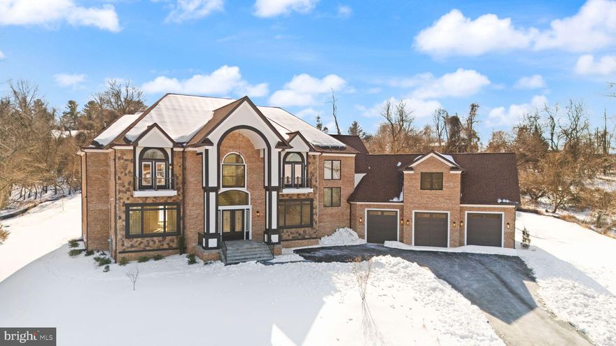 Introducing an extraordinary new construction estate in the prestigious Beacon Hill community of Leesburg, Virginia. Built by the renowned New Village Builders and slated for completion in 2025, this nearly 10,000 sq ft residence on three finished levels offers the ultimate blend of elegance, comfort, and thoughtful design. Step into a grand foyer where you're immediately greeted by a dramatic dual curved staircase and soaring 20+ foot ceilings in the foyer and leading into the family room. The expansive main level is anchored by a stunning great room with a fireplace and open sightlines into a show-stopping kitchen, complete with a massive island, top-tier luxury appliances, and custom finishes throughout. Designed with both everyday living and entertaining in mind, the home features separate formal living and dining rooms that maintain an open-concept flow. A spacious office sits tucked away with access to a full bath. From the attached 3-car garage, a custom dog wash station adds a practical yet luxe touch for pet lovers. Take one of three staircases to the upper level, where you'll find six generously sized bedrooms—each with its own en-suite bath. The primary suite is a sanctuary of indulgence, featuring a spa-inspired bath with a grand shower and soaking tub, a private balcony, and a custom walk-in closet. One of the standout features upstairs is the bonus room above the garage—a flexible space perfect for a second office, studio, or lounge. The fully finished basement offers endless potential with space for a custom bar, sauna, home gym, movie room, second office, and more. Whether you're entertaining or unwinding, the possibilities are limitless. Outside, the home is set up for elevated living with a built-in grilling area and ample space for future enhancements such as a pool, fire pit, or outdoor lounge. Beacon Hill Golf Club: The famed course is reopening in fall as an 18-hole championship layout redesigned. Scenic Beauty & Convenience: Just minutes to downtown Leesburg, with easy access to major commuter routes into D.C., the community offers both serenity and accessibility. This is more than just a home, it's a legacy property in one of Northern Virginia’s most sought-after settings. Don’t miss your opportunity to own a piece of Beacon Hill’s next chapter.