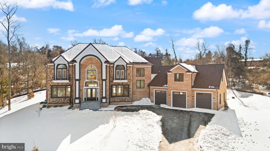 Introducing an extraordinary new construction estate in the prestigious Beacon Hill community of Leesburg, Virginia. Built by the renowned New Village Builders and slated for completion in 2025, this nearly 10,000 sq ft residence on three finished levels offers the ultimate blend of elegance, comfort, and thoughtful design. Step into a grand foyer where you're immediately greeted by a dramatic dual curved staircase and soaring 20+ foot ceilings in the foyer and leading into the family room. The expansive main level is anchored by a stunning great room with a fireplace and open sightlines into a show-stopping kitchen, complete with a massive island, top-tier luxury appliances, and custom finishes throughout. Designed with both everyday living and entertaining in mind, the home features separate formal living and dining rooms that maintain an open-concept flow. A spacious office sits tucked away with access to a full bath. From the attached 3-car garage, a custom dog wash station adds a practical yet luxe touch for pet lovers. Take one of three staircases to the upper level, where you'll find six generously sized bedrooms—each with its own en-suite bath. The primary suite is a sanctuary of indulgence, featuring a spa-inspired bath with a grand shower and soaking tub, a private balcony, and a custom walk-in closet. One of the standout features upstairs is the bonus room above the garage—a flexible space perfect for a second office, studio, or lounge. The fully finished basement offers endless potential with space for a custom bar, sauna, home gym, movie room, second office, and more. Whether you're entertaining or unwinding, the possibilities are limitless. Outside, the home is set up for elevated living with a built-in grilling area and ample space for future enhancements such as a pool, fire pit, or outdoor lounge. Beacon Hill Golf Club: The famed course is reopening in fall as an 18-hole championship layout redesigned. Scenic Beauty & Convenience: Just minutes to downtown Leesburg, with easy access to major commuter routes into D.C., the community offers both serenity and accessibility. This is more than just a home, it's a legacy property in one of Northern Virginia’s most sought-after settings. Don’t miss your opportunity to own a piece of Beacon Hill’s next chapter.