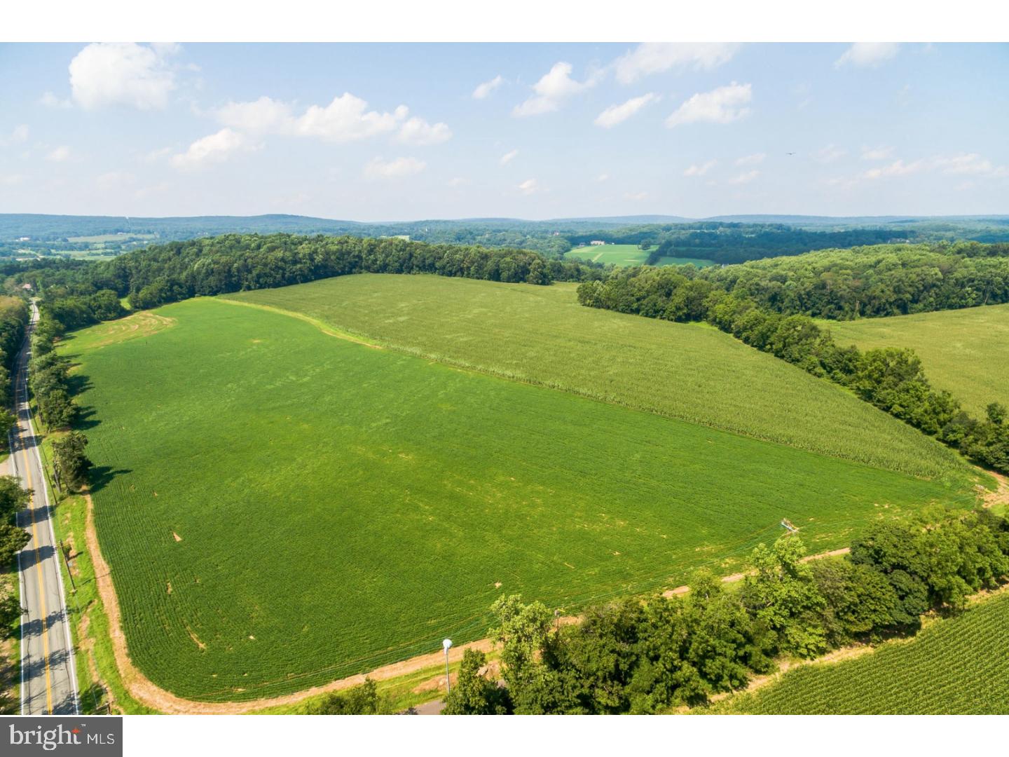 61.9 acres of level fields currently used for agriculture but ideally located for future development. There are no conservation easements on these parcels, which are zoned Agricultural Preservation (which allows single-family residential development on minimum 10-acre lots with a cluster option). Be sure to watch the video for beautiful overhead views.