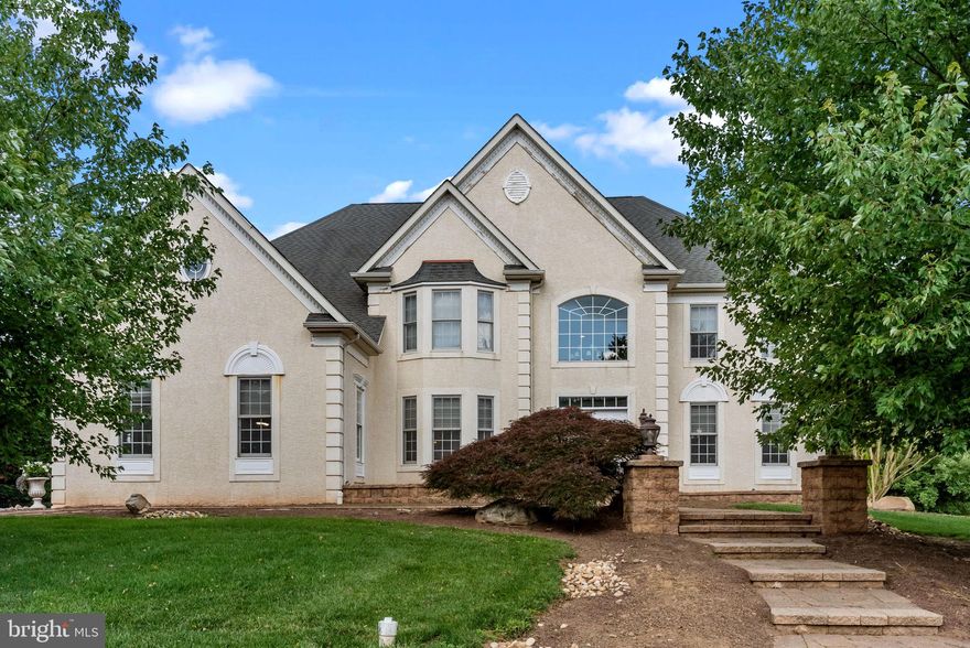 Welcome to the Estates at Warwick Lea, where luxury living meets impeccable design. This stunning property boasts 4 bedrooms, 4 full bathrooms, a half bathroom, and a 3-car garage. As you approach the house, a paver walkway sets the stage for what lies beyond. Upon entering, you are greeted by a grand two-story foyer with a captivating curved staircase.
The first floor offers a range of exquisite spaces. The  foyer leads to a room transformed into a stunning custom bar, perfect for entertaining guests. Adjacent to it, a formal dining room awaits, adorned with hardwood floors, custom trim, and textured wallpaper. The heart of the home is a dramatic two-story family room with coffered ceilings, custom trimwork, and a cozy wood fireplace. Connected to this space is the chef's kitchen, complete with a breakfast room, large island with quartzite countertops, updated backsplash, double wall oven, pantry closet and a Subzero fridge.
The breakfast room seamlessly opens up to an awe-inspiring outdoor area. Step into a world of relaxation and entertainment under a custom pergola equipped with rain sensors, heat lamps, and ceiling fans. An entertainer's dream, this outdoor oasis features a stone fireplace, a saltwater pool, a Jacuzzi, and a built-in kitchen with a grill, refrigerator, and granite countertops. The recently redone back landscaping offers privacy and the perfect backdrop for memorable gatherings.
Ascending to the second floor, you will find the primary suite, complete with hardwood floors, a sitting room, and a spacious walk-in closet. The en-suite bathroom features a Jacuzzi tub, walk-in shower, double sink, vanity tile floors, and a water closet. Bedroom two boasts a princess suite, showcasing hardwood floors, crown molding, and a modern en-suite with a floating sink and a walk-in shower adorned with floor-to-ceiling tile. Bedrooms three and four also feature hardwood floors and have access to a tastefully remodeled Jack and Jill bathroom.
But the wonders of this property don't end there. Descending to the basement, you'll discover a world of entertainment and relaxation. A full wet bar, complete with a fridge, wine fridge, and granite countertops, sets the stage for memorable gatherings. Adjacent to it, a gym area awaits, as well as your own personal spa room, boasting a full bathroom, sauna, and steam room. Additional features include a cedar closet, offering ample storage space.
This impeccable property truly has it all. From its luxurious interiors, including the custom bar, formal dining room, and two-story family room, to its breathtaking outdoor area with a pergola, fireplace, saltwater pool, and Jacuzzi, every detail has been thoughtfully designed. The updated bathrooms, hardwood floors, and tasteful finishes throughout add to the appeal. Whether you seek an entertainer's paradise or a private sanctuary, this exceptional home in the Estates at Warwick Lea will surpass your every expectation.