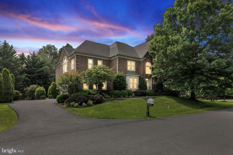 Welcome to 18309 Eldorado Way, a stately all-brick Grand Rembrandt model located in the prestigious gated community of River Creek. This expansive 5BR/4.5BA home offers over 7,200 finished sq ft on a  0.28-acre landscaped lot backing to peaceful parkland. Step inside to a grand layout featuring hardwood floors, dual staircases, a chef’s kitchen with granite countertops and stainless-steel appliances, and elegant formal spaces perfect for entertaining. The finished lower level includes a brick pub like area,     with fireplace, ideal for gatherings or relaxation, a wine room, exercise room,  office or playroom and full bath, yet still has storage space.

The spacious design, architectural details, and windows in this home  provide an abundance of natural light provide the perfect foundation for your personal touches With a bit of vision and creativity, this home offers a remarkable opportunity to reimagine and customize a truly impressive space that fits your lifestyle. Picture your ideal décor, furnishings, and finishes bringing this home to life.

Enjoy outdoor living on the screened and open deck overlooking a private, fenced backyard. River Creek’s resort-style amenities include a clubhouse, golf course, pool, tennis courts, trails, and more—all within a vibrant waterfront community. With easy access to major roads, Metro, Dulles Airport, and downtown Leesburg. This home is available at a unique moment in time and represents a compelling opportunity for the right buyer.  Schedule your private tour today!