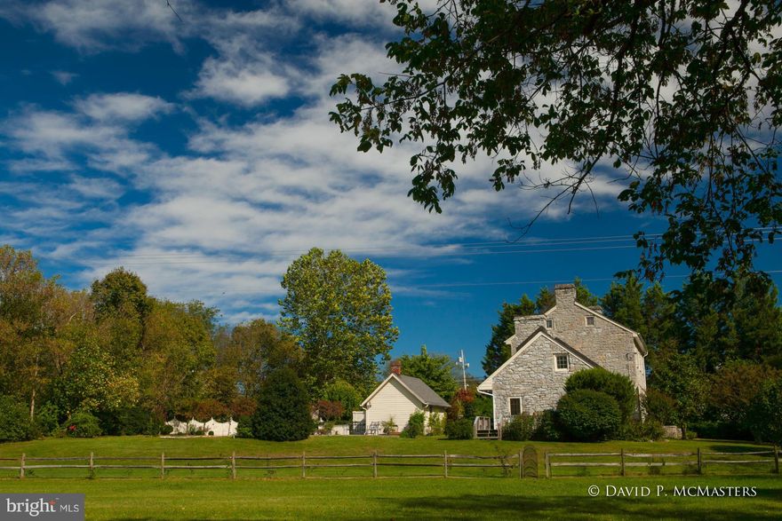 "Lower Liberty, ca 1810! Stone colonial home,5.7 acres, w/ in-ground pool, stream forms boundary. Beautiful home and grounds.  Rural setting/view, but 1.4 mile to I-81,exit 5; 10 to Winchester VA;  60 to DC beltway. Original floors, moldings, 6 FPs stone,raised panels.    New ceramic baths. Glorious added family room w/ vaulted 12' ceiling, stone wall.  Masterfully updated. Adj.farm conserv land.