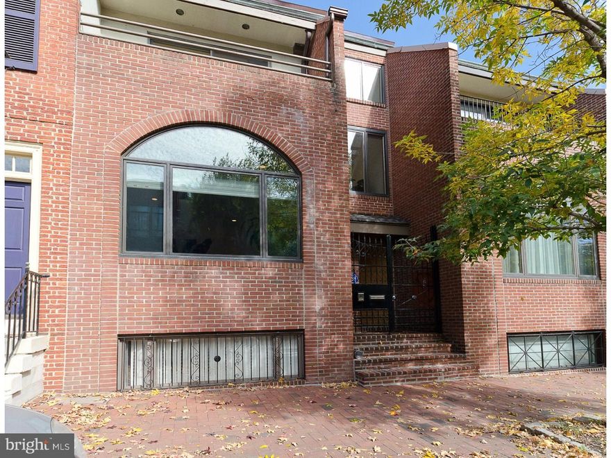 Classic mid-century modern town-home situated on one of Society Hill's most picturesque blocks. With southern orientation the home is very bright and features a split, open floor-plan with 3 bedrooms, 3 full baths, 2 powder rooms, living room w/ vaulted ceilings, formal dining, chef's eat-in kitchen and hardwood floors.  In addition you have one (1) car attached garage PLUS two (2) car parking and gated driveway.  Value continues to round up with two (2) fireplaces, den, bonus room, two (2) terraces and a large deck off of the kitchen designed for outdoor grilling and dining.  The home is centrally located to all of Philadelphia's historic landmarks, restaurants, commerce and close proximity to the city's primary highway systems yielding easy access for commuters.