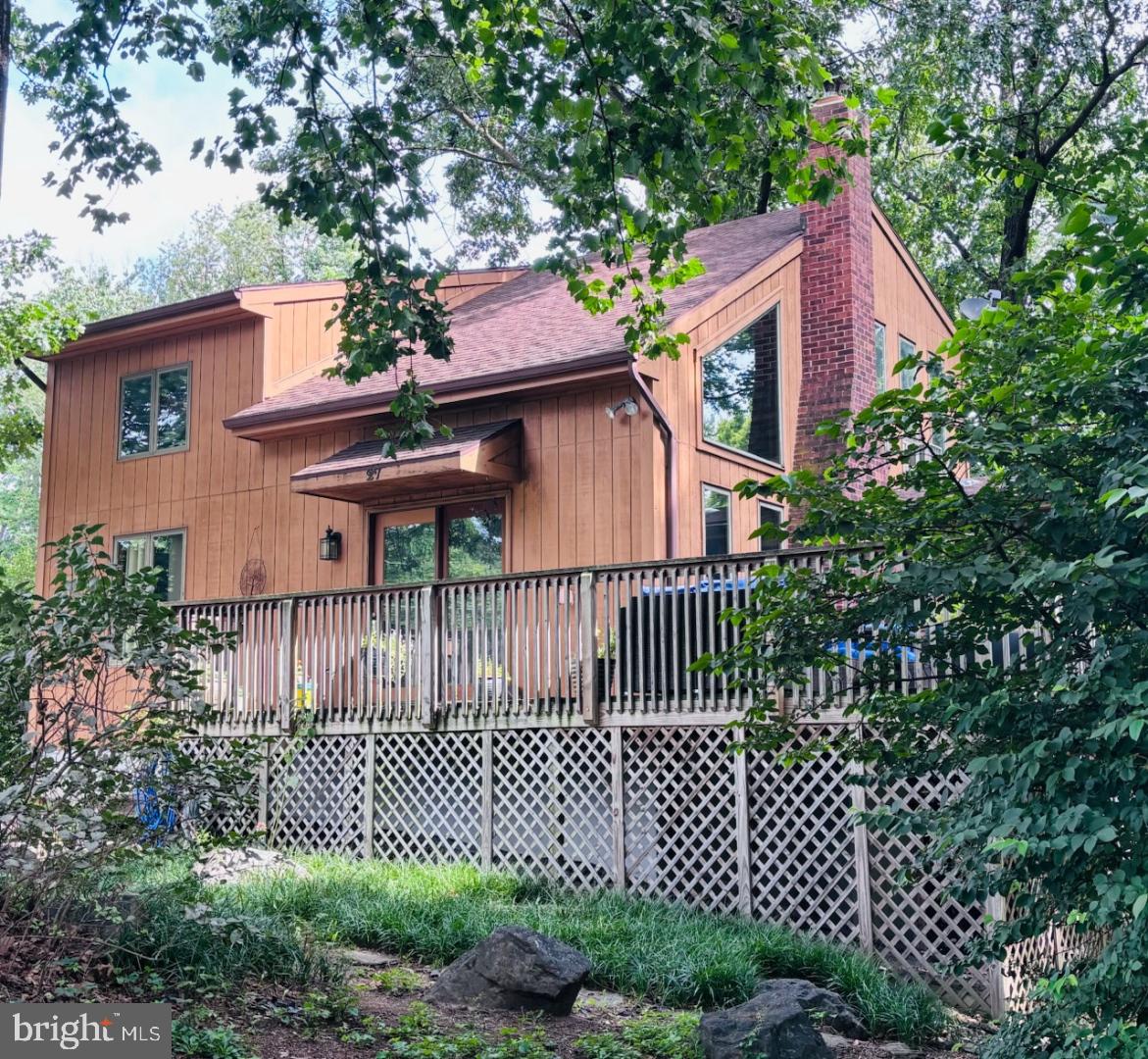 Just Added: Stunning New Photos! Tucked away at the end of a peaceful cul-de-sac, this captivating modern-contemporary home perfectly blends style, comfort, and serenity—just minutes from Liberty Mountain Resort.
Whether you're searching for a forever home, a weekend retreat, or a lucrative Airbnb investment, this property is a must-see! Step into the sun-drenched living room where oversized windows frame tranquil views of trees and wildlife. Soaring ceilings complement the warmth of a brick fireplace with a wood stove insert, creating a cozy yet airy space.
The open-concept layout effortlessly connects the kitchen, dining, and living areas—ideal for everyday living and entertaining. Step out to the screened-in porch with a private hot tub for year-round relaxation. Enjoy the expansive wraparound deck, then head to the backyard campfire area to roast marshmallows under the stars.
This inviting home offers four bedrooms plus a versatile bonus room perfect for a home office, guest space, or playroom. The main level includes one bedroom with an attached half bath, also ideal as a home office. Upstairs, you’ll find three additional bedrooms and a full bathroom.
The finished walkout lower level expands your living space with a second full bath, bonus room, utility room, and a spacious family room that opens to a covered patio.
With easy commuter access to Maryland and D.C., and close proximity to Appalachian hiking trails, Gettysburg Battlefield, golf, and ski resorts—this home offers peaceful mountain living with everyday convenience.
Motivated sellers—don’t miss your chance to make this special property yours. Schedule your showing today!