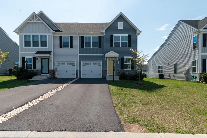 Spacious 4-bedroom, 2.5-bath end-unit townhome in a well-located Martinsburg community! Only 4 years old, this home offers two finished levels, an unfinished basement, and a 1-car garage. The main-level primary suite features a walk-in closet and private full bath with a walk-in shower for easy one-level living. The kitchen includes stainless steel appliances, ample counter space, and a center island with seating for 3. A main-level washer and dryer add everyday convenience.

Upstairs, you’ll find three additional bedrooms and a full bath, offering flexible space for guests, family, a home office, or hobbies. As an end unit, this home also offers a little extra yard space to enjoy. The level backyard is ready for relaxing, grilling, and spending time outdoors.

Enjoy low-maintenance living along with community amenities that include a dog park, walking trail, and more. Conveniently located near shopping, restaurants, medical facilities, the Veterans Administration, commuter routes, and several nearby colleges and universities, this home offers easy access to everyday needs. With quick access to Route 340, Highway 9, and I-81, commuting is simple and convenient.