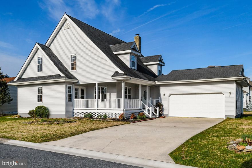 Beautiful 3 BR/3.5 BA home with upgrades galore in the community of Oyster Harbor.  You will love the layout of this home with a first floor master bedroom and bath.  The kitchen will delight the chef in your family with upgraded countertops, stainless steel appliances, upgraded cabinets and flooring.  The large open family room with fireplace makes this the perfect year round residence. There are 2 additional bedrooms each with it's own private bath for family and friends.  You will love the location of this home close to the community pool. Come take a look today before it's sold! The home has been freshly painted and being sold partially furnished as shown.