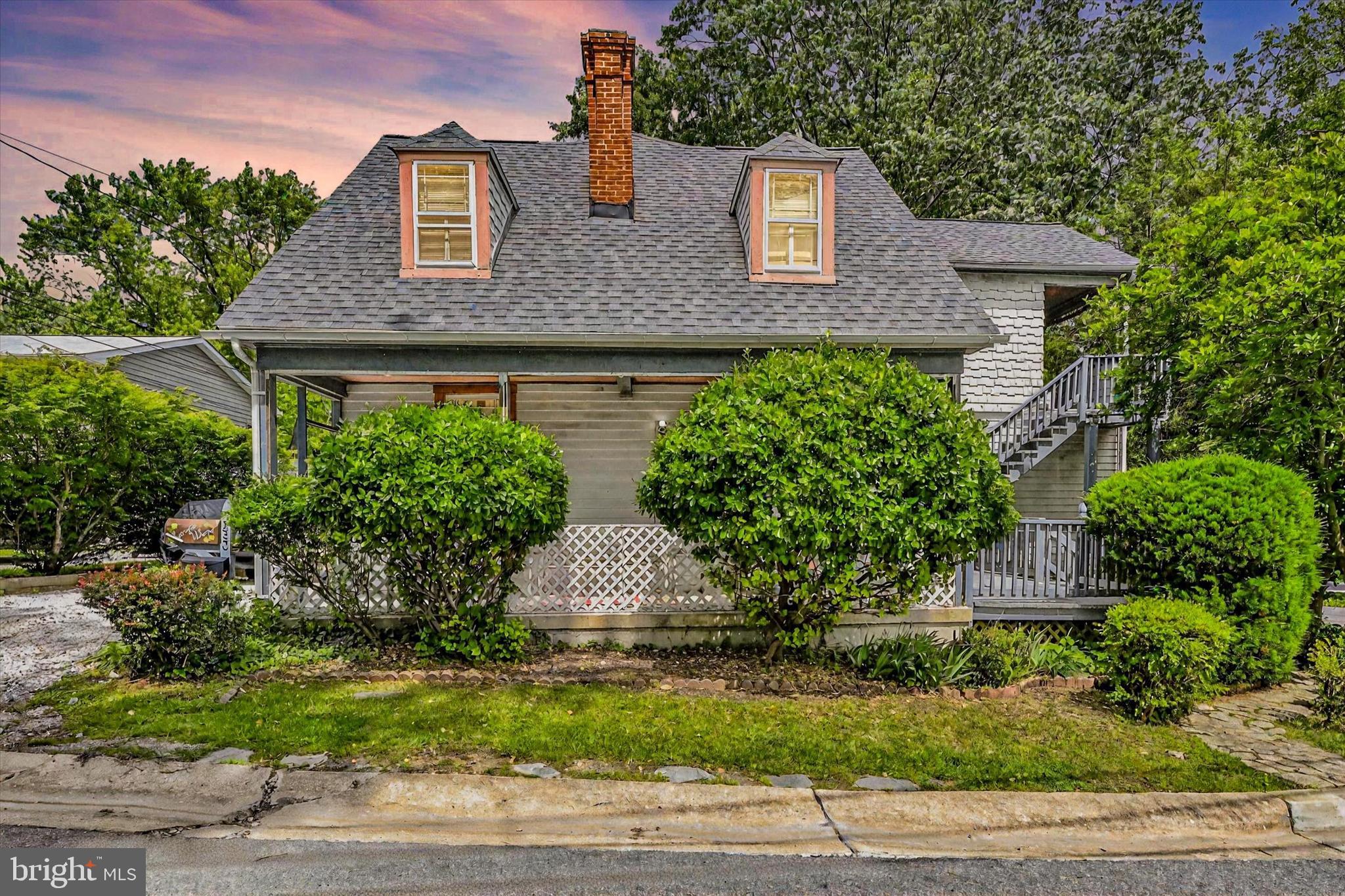 This unique property offers three possible living spaces: a spacious main unit with 3 bedrooms—including a primary suite with a private bath and cozy sitting area—a charming 1-bedroom apartment, and a separate 1-bedroom cottage tucked away in the rear. Whether you're seeking an income-producing investment, multigenerational setup, or the option to combine it all into one grand residence, the flexible layout adapts to your vision.
Live in the main home and rent out the other two units for impressively low living expenses—perfect for house-hackers or savvy buyers looking to offset their mortgage.
Sip lemonade on the front porch after a stroll along the nearby Short Line nature trail, or unwind beside one of the home’s decorative fireplaces. Just steps from Catonsville’s beloved shops, restaurants, and local events—this is a rare opportunity bursting with charm and potential.
Don’t let this gem slip by!
