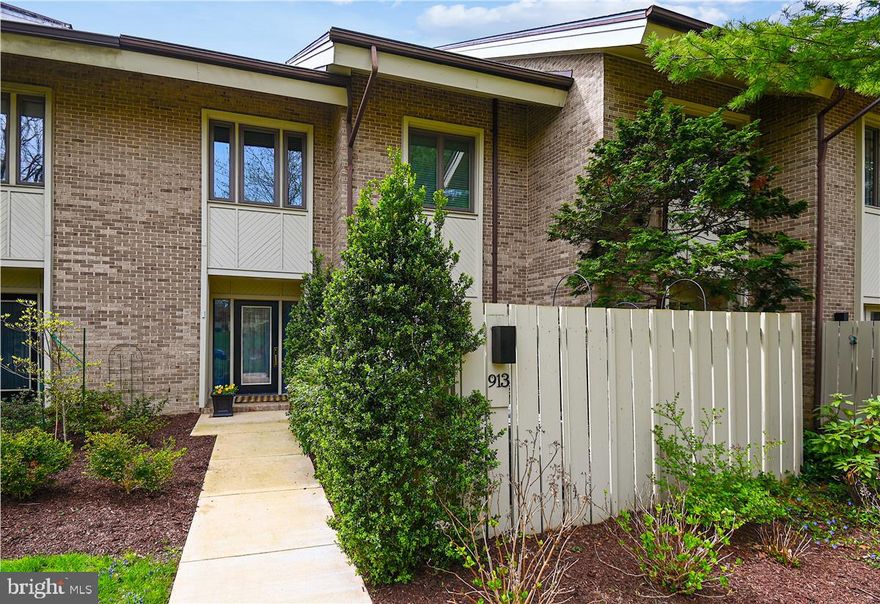 Looking for a Roland Park-esque house without the toils of old house maintenance?  Look no further than 913 Drohomer Place!  This fabulous home in Roland Park North exudes the character and feel of a classic home but offers all the conveniences of townhome amenities.  Beautifully appointed and updated, there is nothing to do but move in and enjoy.  The modern kitchen is stunning and opens to a cozy den that in turn opens to a private, gated patio.  Morning coffee options never felt so good!  The traditional dining room and adjacent living room are gracious and glorious – custom built-in cabinets, hardwood floors, fireplace and  well-designed lighting.  The living room opens to  a spectacular deck perfect for al fresco dinner parties as you  overlook vast green space.  The second level includes a marvelous primary suite – soaring ceiling height, a Juliet balcony and an updated bathroom that is a show stopper – from the spacious walk-in closet to the extra large shower stall to a contemporary tub that could be a piece of art!  Two more bedrooms on the second level, along with laundry provide all the space you could want.  And there’s plenty more to be found.  The third level bonus room was thoughtfully enclosed to provide privacy and natural light.  The ample storage space and full bathroom give endless options to its use – a fourth bedroom, home office, exercise room, studio – check, check, check, check.   Let’s not forget the lower level - a fully finished basement with another full bathroom.  And if that isn’t enough?  We think we found the most organized, clean, and functional two-car garage.  Your cars will be just as happy as you are living here.  The space in this home in amazing and the care by its owners immaculate – updated systems (HVAC and water heater), new windows and doors, a detailed list!  Roland Park North is a hidden gem in the heart of Roland Park.  Come see why we are so smitten by this pristine and perfect home.