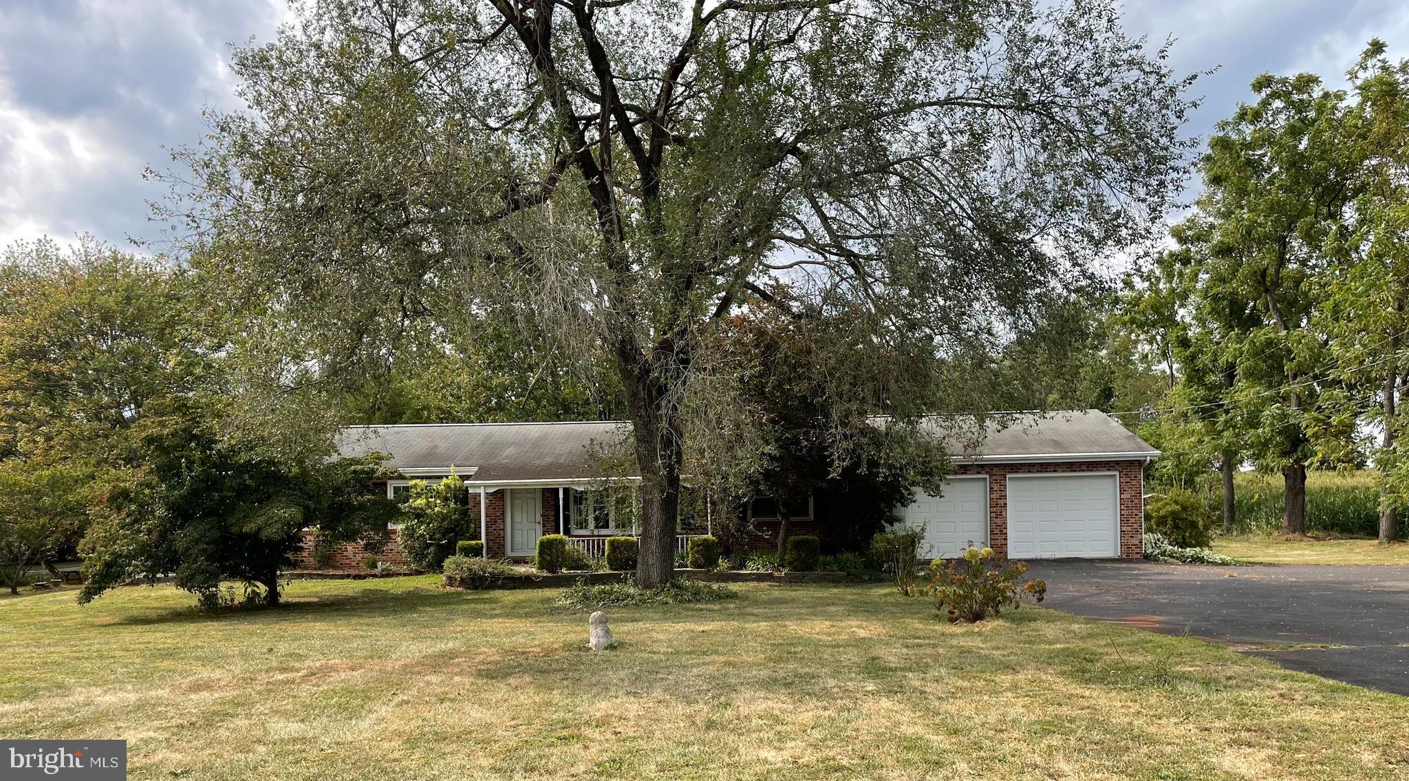 Charming Rancher on 2 acres in Littlestown! Discover the potential in this 3-bedroom, 2-bath rancher situated on 2 beautiful acres in Adams County. Offering plenty of space inside and out, this home is perfect for those looking to enjoy the peace of country living while still being close to town. Features all stainless steel appliances, washer and dryer included. Kohler Generator, full unfinished basement, spacious two car garage. With a little TLC, you can make this property truly shine! Don't miss your chance to invest in a property with great bones and endless potential!