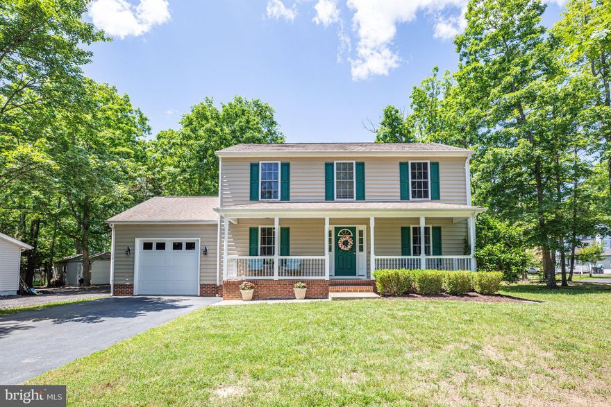 Welcome to 125 Republic Avenue in Lake of the Woods in beautiful Orange County.  This 3 bed 2.5 bath home will be sure to please, with spacious and airy feeling that the square footage belies. The welcoming feeling starts before you even enter the house with a front porch that is made for relaxation and curling up with your morning coffee and a good book.  The main level offers a functional layout with great flow between living spaces and overhead lighting in every room.  A formal dining room, currently being used as a den, sits to the left of the entry and has direct access to the kitchen.  Opposite the den area is the family room which manages to be cozy and warm while offering a large space with tons of natural light, and room for all of your family and friends.   Continue to the kitchen, which has been updated top-to-bottom.  The owners have dialed in on a design that is stylish and on-trend, but will stand the test of time.   The sparkling white quartz counters play beautifully off the dark royal cabinetry and stainless appliances.   Entertaining is easy and with an eat-in area as well as a peninsula with seating, allowing the chef to be part of the fun! The composite deck is just through the door and offers a great extension to the kitchen.  With enough space to choose a sunny or a shady spot, this deck will be a favorite area for the whole group.  An updated half bath,  full laundry room, and an oversized 1 car garage with overhead storage finish off this level.  Head upstairs to discover the primary bedroom that is large enough to accommodate a king bed, dressers, and even an office space.  You will have plenty of room for your wardrobe, with two closets, including a walk-in with a window!  Two generously sized secondary bedrooms share a recently refreshed hall bath.  Just as downstairs, all rooms have convenient overhead lighting, which is often overlooked in many home designs. 
You will not want to miss this one.  Pride of ownership shows throughout and will make you feel right at home in 125 Republic Avenue.  Make sure to get in touch to book your private showing, or attend an Open House.  Open House  Sunday 5/26 11-2 pm.  Make sure to use the MAIN gate to enter.