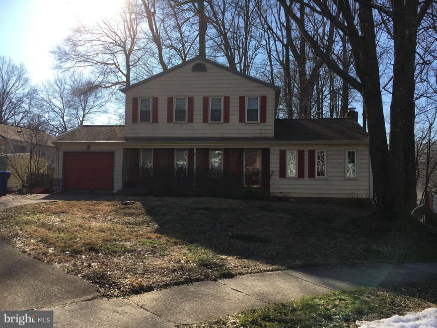 Investors dream- Cul-de-sac street.  Roof 5 years old, Renovated Baths, SOLD AS IS.  3 BR, 2.5 BH, Formal living room, Formal Dining Room Eat in kitchen, Family Room with Fireplace. Unfinished Basement. 2 Metro Bus Stop .Less than a mile to VRE station