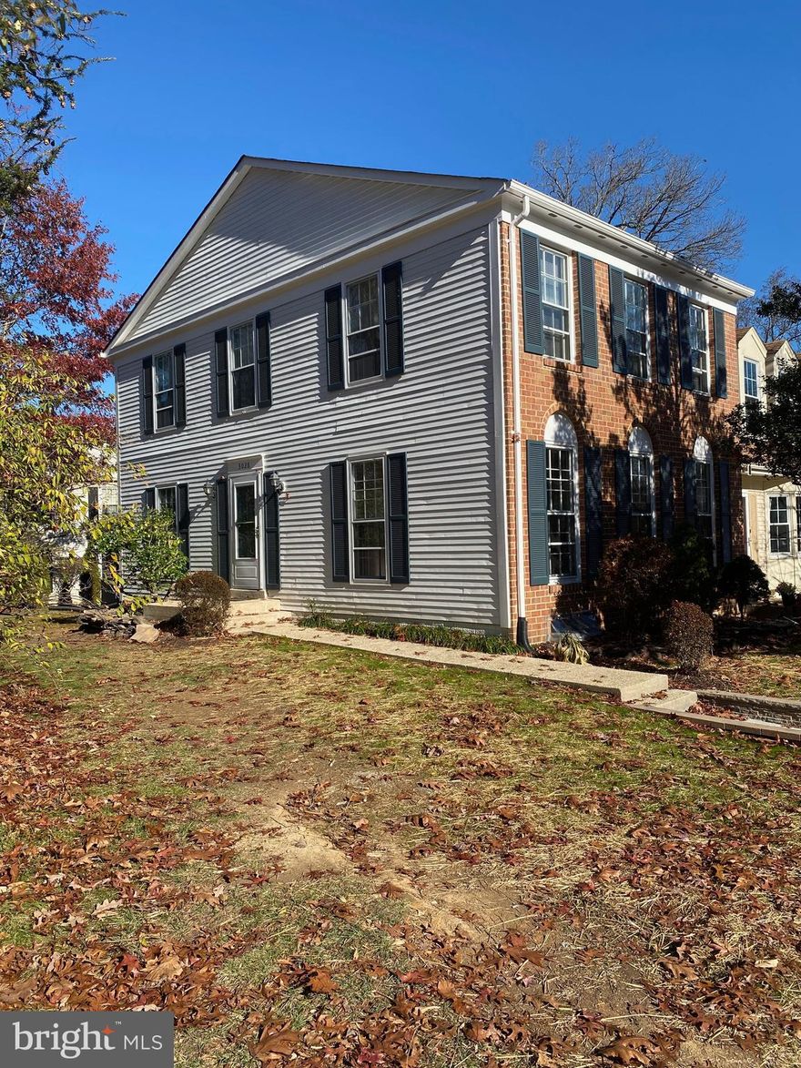 Potential, potential, potential! Large End Unit Townhouse with new wood bamboo floors on main level offers unique privacy.   3028 Dunleigh Court provides almost 1,600 square feet on the top two levels with 3 bedrooms, 2 full bathrooms on the upper level. The main level has large living room, separate dinning room, kitchen and powder room.  Lower level has large family room with wood burning fireplace, laundry room, a half bath and a "bonus" room.  Kitchen opens to a large newly constructed deck, ideal for outdoor dinning and entertaining.  Kitchen's large footprint offers endless possibilities for the creative "do-it-yourselfer" which is reflected in the below market price.