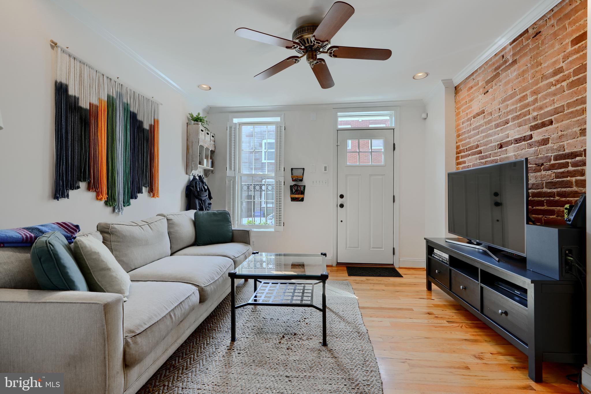 Pride of ownership abounds in this well maintained 2 bed 2 bath Butchers Hill beauty! The main level features hardwoods, open layout, recessed lighting, stainless appliances, and access to cosy rear patio with spiral staircase leading to upper level deck. On the 2nd floor find a full bath, 2nd bedroom with walk in closet, and convenient laundry. On the 3rd floor enjoy a primary suite with full bath, walk in closet, and charming, exposed, ceiling beams. Great proximity to JHH, Patterson Park, and many wonderful shops and restaurants.