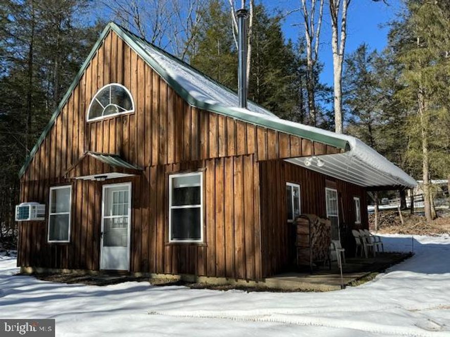 New Lancaster Valley Cabin. 1.5 story cabin has 2 bedrooms and 1 full bath. Unfinished 3rd bedroom/bunk room on 2nd floor. Constructed in 2004 with slab on grade construction. Board and batten siding with long lasting metal roof.  Multiple heat sources including baseboard electric, corner woodstove on stone hearth and a ventless propane fireplace. Easy all season access via a shared roadway. 1 car carport and storage shed for storage.  Most contents remain including furniture, stackable washer/dryer, range and refrigerator. You are located near many attractions including Poe Valley, Poe Paddy, Reeds Gap State Park, Bald Eagle State Forest, Honey Creek, Penns Creek and numerous hiking and biking trails just waiting for you to explore. A great place for PSU football games and other events, about 35 minutes from State College.