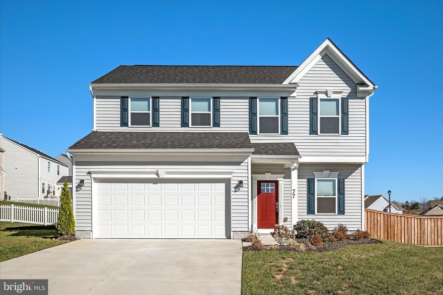 New Price! Welcome to 77 Signal Knob Cottage Drive in the charming Town of Strasburg! Located in The Village at Cedar Creek subdivision. Modern style colonial home offers 4 bedrooms, 2.5 baths - Situated in the beautiful Shenandoah County. Enjoy an open floor plan with luxury vinyl plank flooring throughout the main level,  custom blinds, a gourmet kitchen featuring stainless steel appliances, gas stove, granite countertops, water filtration at kitchen sink, plenty of cabinet space, and an upgraded sunroom.. Wired network in all living locations, whole house audio. Natural gas heat adds comfort in the winter months. The upper level includes spacious bedrooms, a primary suite with a walk-in closet, and a spa-like bath. Convenient upper-level laundry adds ease to everyday living.  Outside, you’ll find an oversized fenced backyard with a large patio, gas hookup for gas grill—perfect for relaxing or entertaining. Excellent commuter location just minutes from I-81 and I-66, and close to shopping, restaurants, vineyards, and Strasburg’s walkable downtown known for its pottery, antiques, historic charm, and breathtaking views of the Shenandoah Valley.  All sizes are approximate.