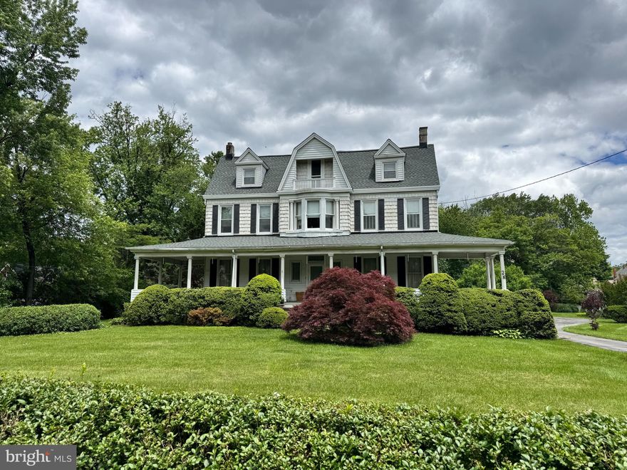 Welcome to this timeless Catonsville gem—where character, an open floor plan,  charm, and convenience meet! Ideally located within walking distance to top-rated schools, beloved local shops, and popular restaurants, this classic home offers the perfect blend of historic appeal and modern potential.  With some work, this home will be a masterpiece.
Step onto the expansive wrap-around porch, perfect for morning coffee or relaxing summer evenings. The large front yard adds to the home's impressive curb appeal, while the scenic backyard offers a private oasis for entertaining, gardening, or simply enjoying the outdoors. A spacious circular driveway ensures plenty of parking for family and guests.
Inside, you'll find hardwood floors throughout, multiple fireplaces and a wood-burning stove, and large windows that flood the home with natural light. With ample living space across the main level, there's room for every lifestyle—from cozy evenings in to lively gatherings.
Upstairs, discover five generously sized bedrooms and two full bathrooms, providing comfort and flexibility for a growing family or guests. The walk-up attic features high ceilings and abundant space, offering the potential for a third finished level—perfect for a home office, playroom, studio, or additional bedrooms.
Additional highlights include a brand-new roof, timeless architectural details, and the warmth and character only a classic Catonsville home can offer.
Don't miss your opportunity to own this incredible property in one of the area's most sought-after neighborhoods!