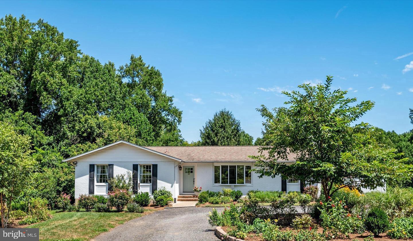 Whether you are in search of a haven for horses, farming or simply enjoying the outdoors, this 5.9 acre property in the heart of southern Anne Arundel County horse country and the Marlboro Hunt territory with 3/4 Bedrooms & 3 full bath rancher offers an abundance of opportunities. Step inside and you are welcomed by the sun-drenched living room that opens to dining room and kitchen with recently updated appliances and breakfast bar that adjoins to main-level family room with gas fireplace, Primary bedroom with primary bath ensuite and two additional bedrooms and full bath on this level too! Rear deck off kitchen, offers room to grill, dine and relax while taking in the pastural views as well as magnificent sunsets, Lower level with with walk out exit with second family room, office/4th BR, kitchenette, full bath plus utility room with ample storage space, HVAC replaced in 2021, water heater 2022 and roof estimated to be 8 yrs old, 46' x 50' barn built in 2018 offers five 12x12 stalls, hay room, tack room w/heat & sink, wash stall with hot/cold water and R/I in stalls for automatic water, Stalls have rubber interlocking mats, Pastures and fields include dry paddock, 80x150 sand & fiber ring with lighting, RAMM fencing in pastures with electric wire, This farm is truly special from the raspberries along the perimeter and ending at the edge of stream which feeds to Tracy Creek and the well thought out abundance of flowers and gardens to nurture the wildlife and nature, Only fifteen minutes to the Showplace Arena/Equestrian Center. This home is also conveniently located to the DC , Baltimore and Annapolis job markets and in the Southern High School district, Shopping, desired services and amenities including waterfront dining on the West River in close proximity.